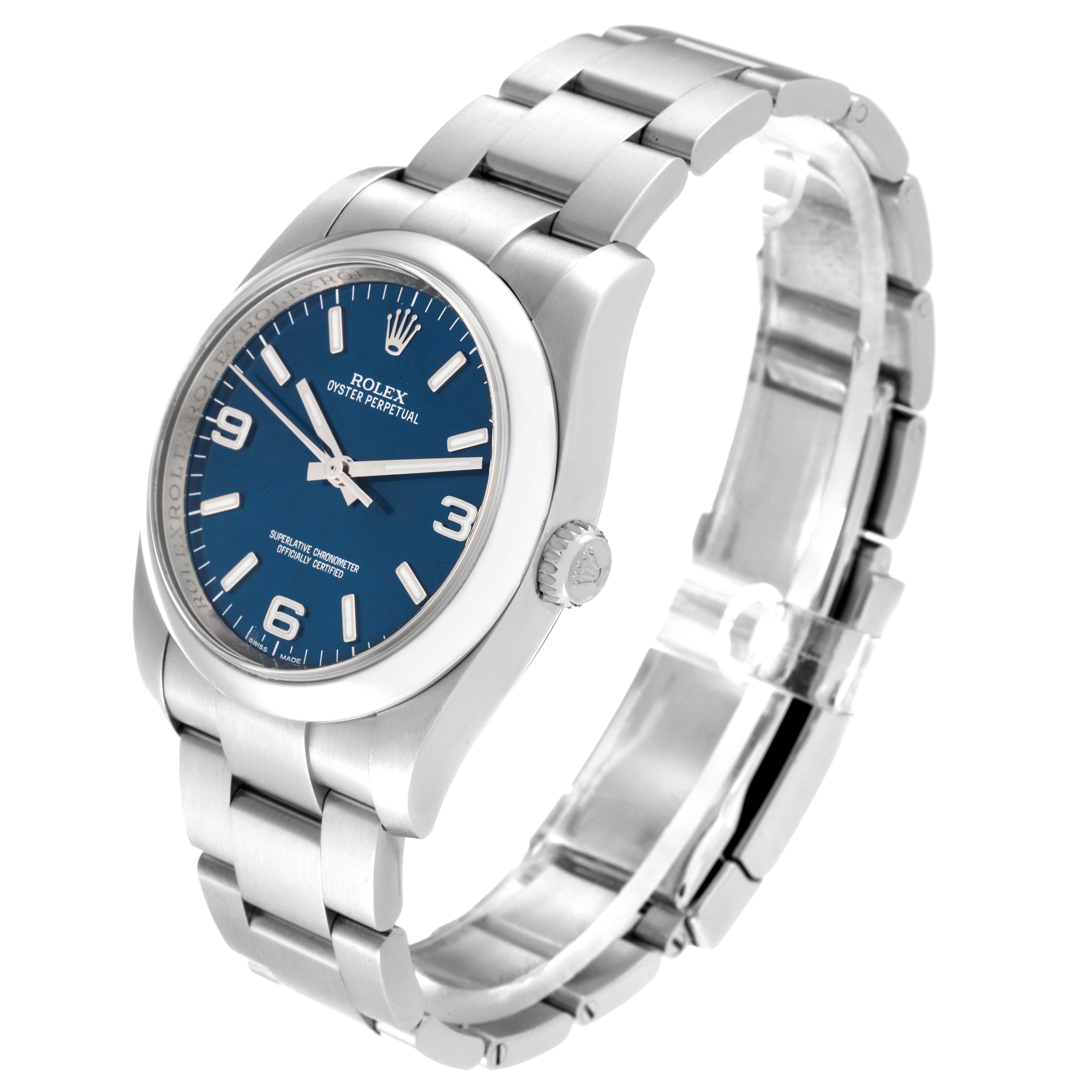 This Rolex Oyster Perpetual 116000 Men's Stainless Steel Blue Dial 116000 Men's Stainless Steel Blue Dial watch is shown from a front angle, displaying its blue dial, bezel, crown, and bracelet.