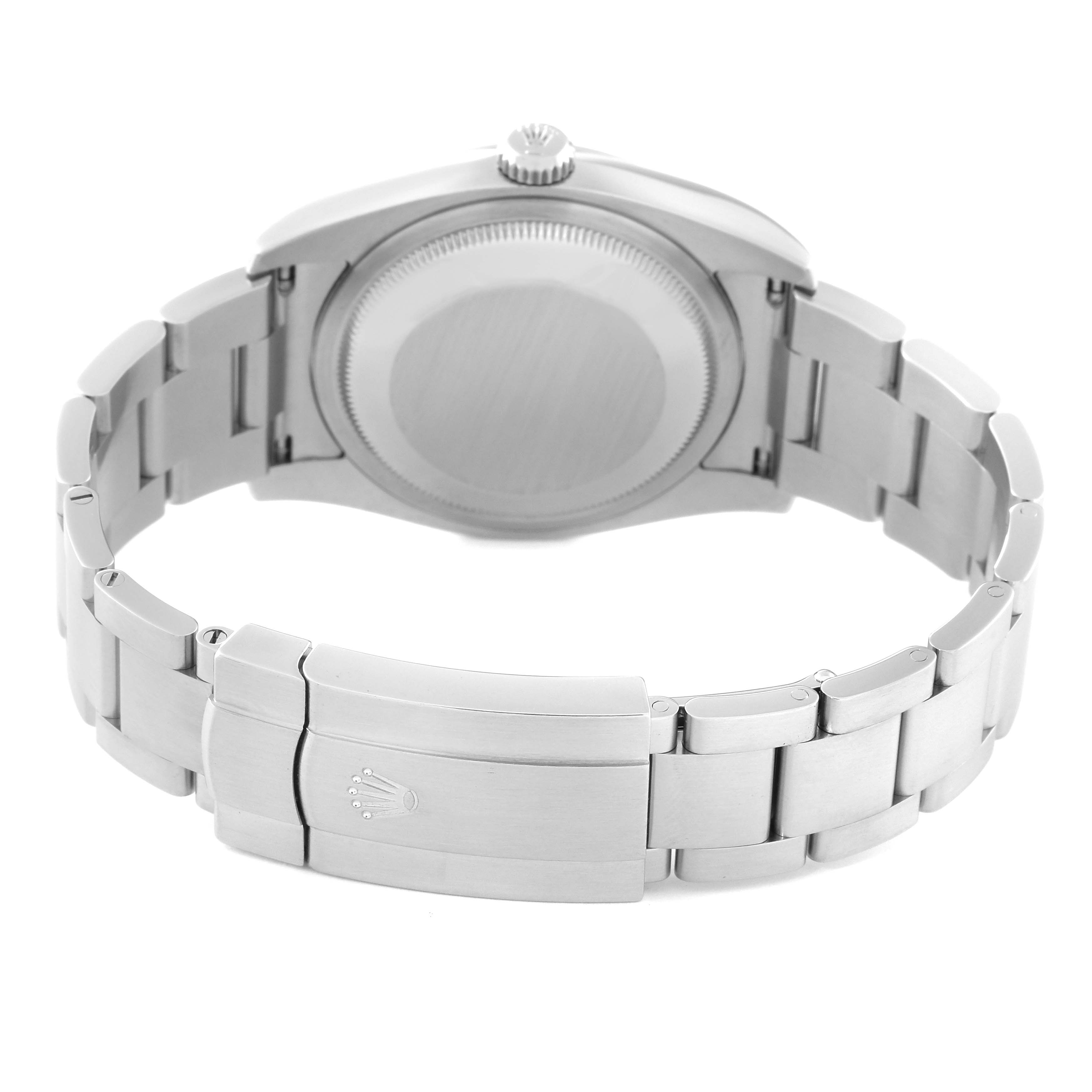 This image shows the back of a Rolex Oyster Perpetual 116000 Men's Stainless Steel Blue Dial 116000 Men's Stainless Steel Blue Dial watch, featuring its clasp and bracelet links.