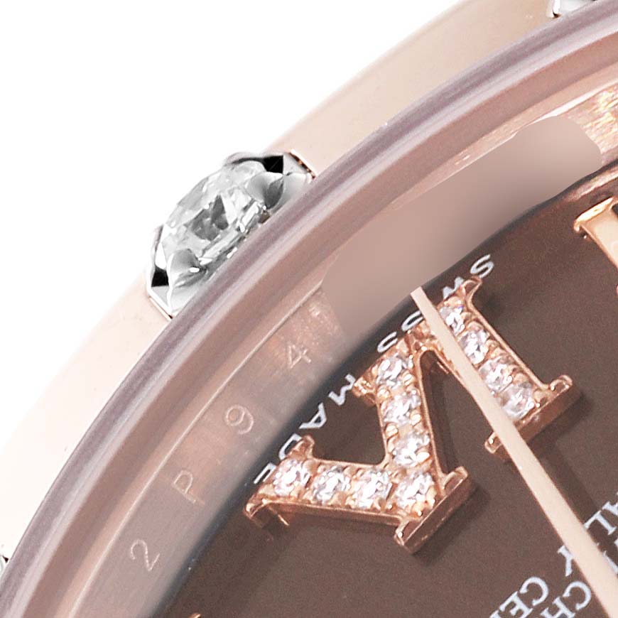 This close-up angle of the Rolex Pearlmaster 81315 Women's Rose Gold Brown Dial 81315 Women's Rose Gold Brown Dial watch shows part of the dial and bezel set with a diamond.