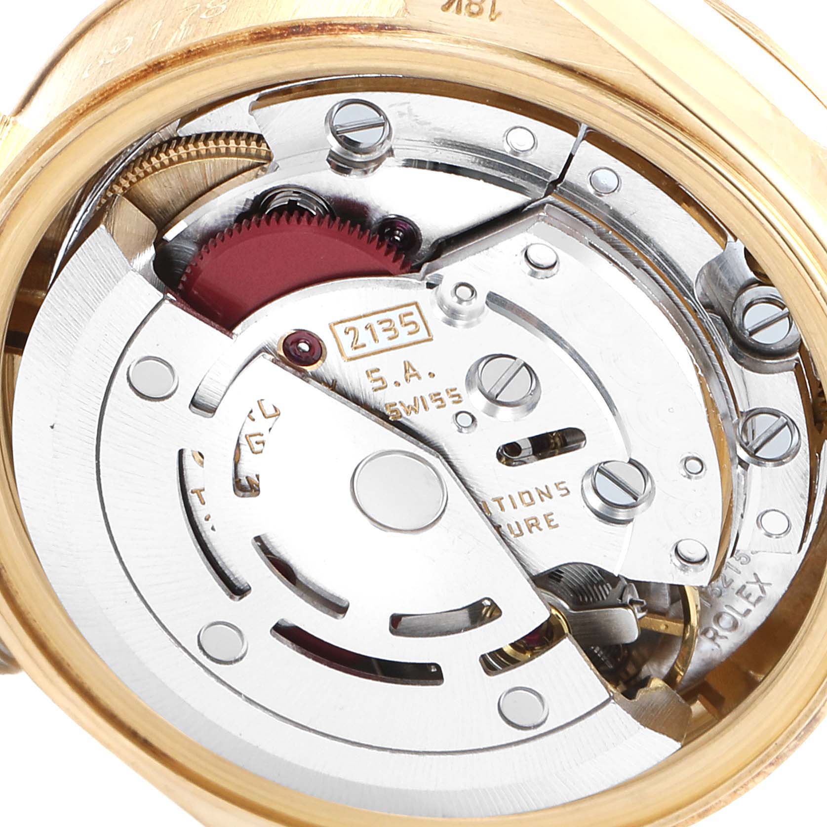 The image shows the movement mechanism of a Rolex President 69178 Women
s Yellow Gold Champagne Dial 69178 Women
s Yellow Gold Champagne Dial model watch, captured from the back with its case opened.