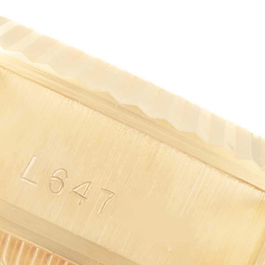 The close-up image shows the side edge and serial number engraving of a Rolex President 69178 Women's Yellow Gold Champagne Dial 69178 Women's Yellow Gold Champagne Dial watch.