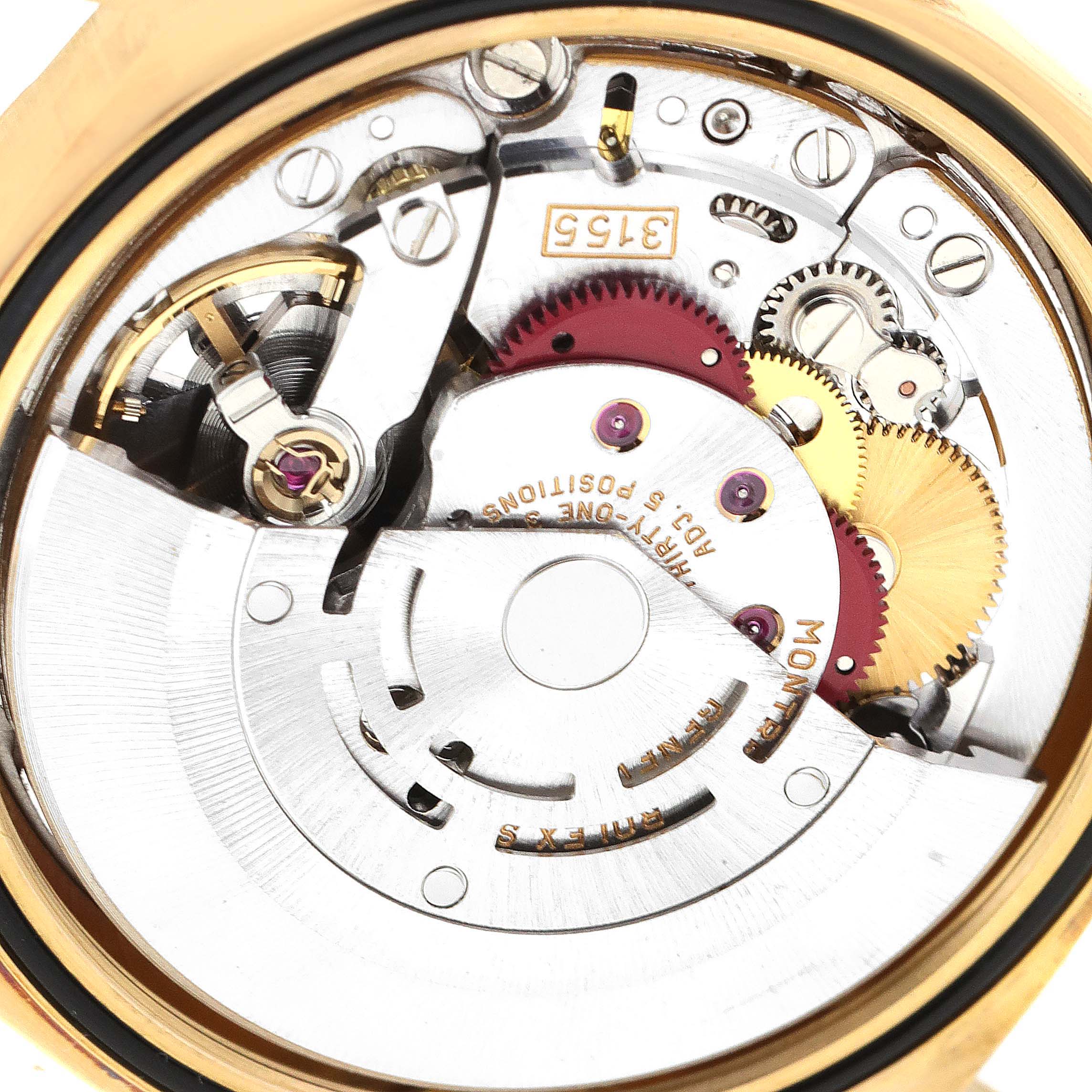 This image shows the inner mechanism of the Rolex President 18338 Men's Yellow Gold Champagne Dial 18338 Men's Yellow Gold Champagne Dial model, highlighting gears and the rotor.