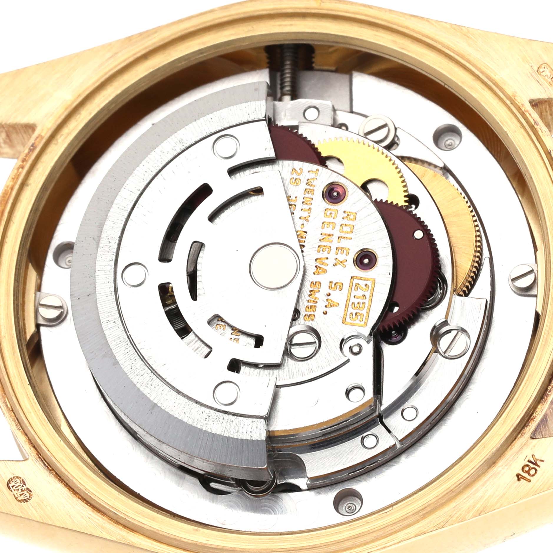 The image shows the internal mechanism of a Rolex President 68278 Women
s Yellow Gold Champagne Dial 68278 Women
s Yellow Gold Champagne Dial model watch, focusing on the movement and rotor.