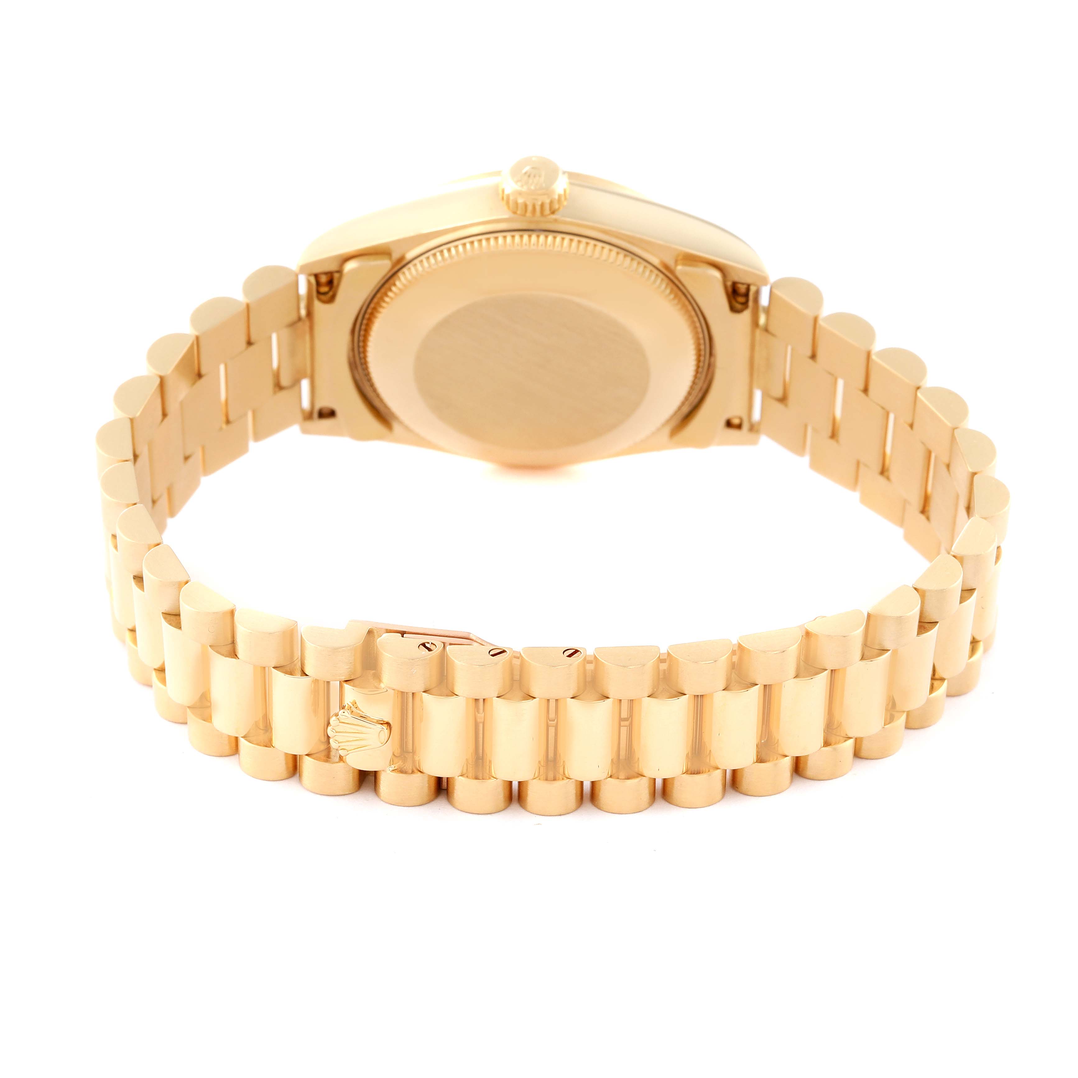 The image shows the backside of a Rolex President 68278 Women
s Yellow Gold Champagne Dial 68278 Women
s Yellow Gold Champagne Dial model watch, highlighting the case back and the gold bracelet with the clasp.