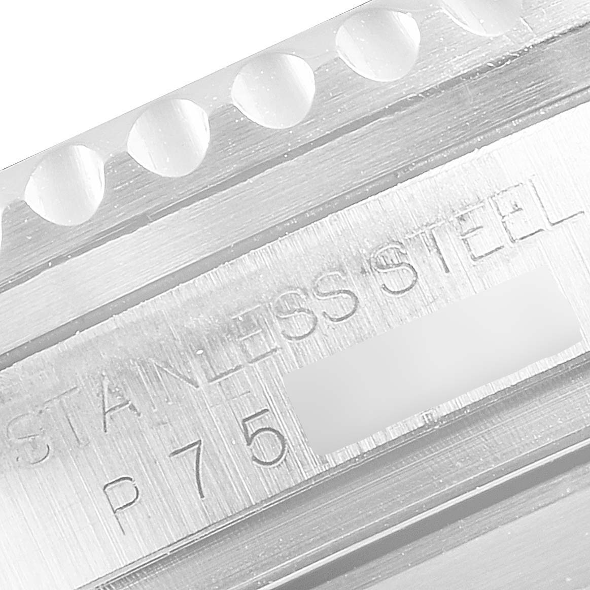 This is a close-up view showing the stainless steel engravings and part of the bezel of the Rolex Sea-Dweller 16600 Men
s Stainless Steel Black Dial 16600 Men
s Stainless Steel Black Dial model.