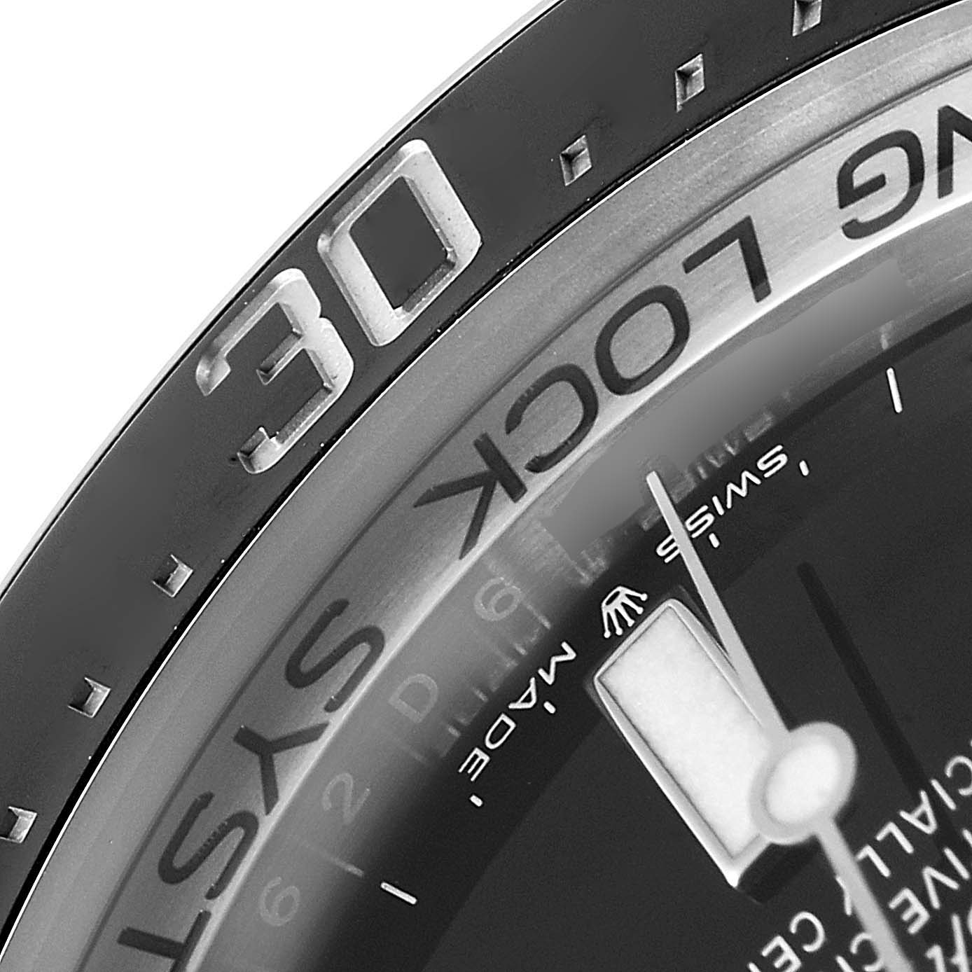 This image shows a close-up of the bezel and dial of a Rolex Sea-Dweller 126660 Men's Stainless Steel Blue Dial 126660 Men's Stainless Steel Blue Dial watch, focusing on the "30" minute marker and part of the "RING LOCK SYSTEM" text.