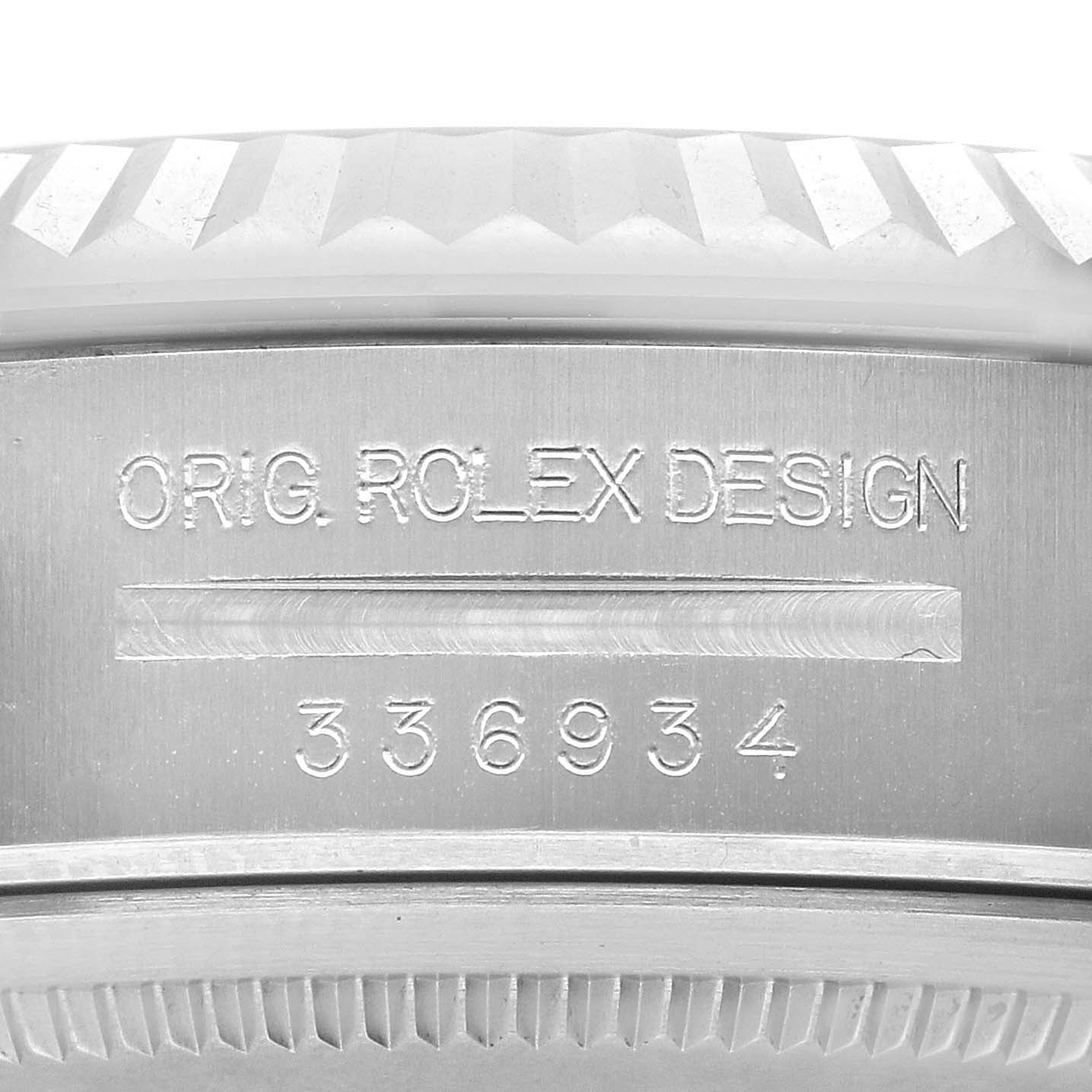 The image shows a close-up of the side of a Rolex Sky-Dweller 336934 Men's Stainless Steel Green Dial, highlighting the engraved design and model number.