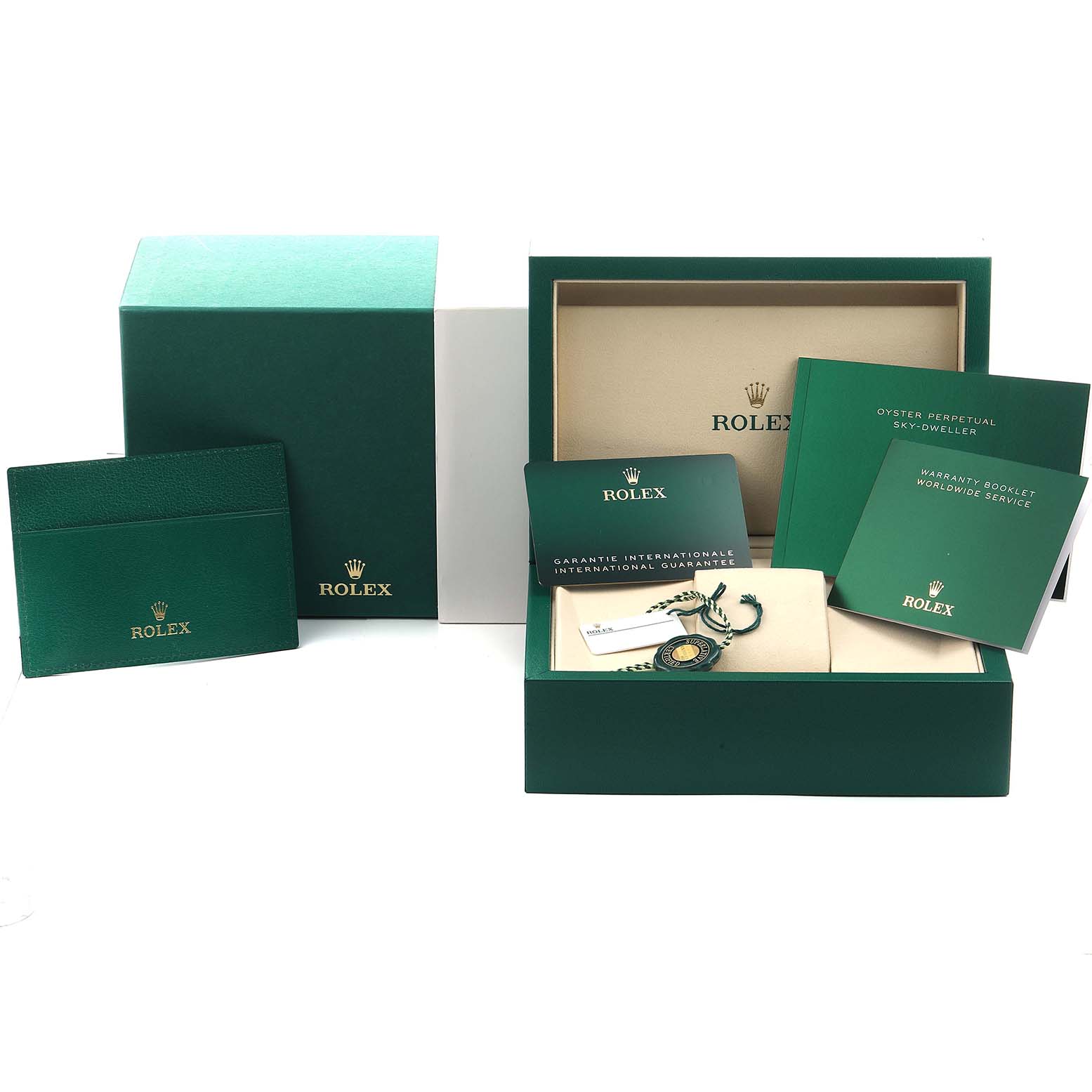 The image shows a Rolex Sky-Dweller 336934 Men's Stainless Steel Green Dial box set with booklets, warranty card, and tag, displayed from a front angle.