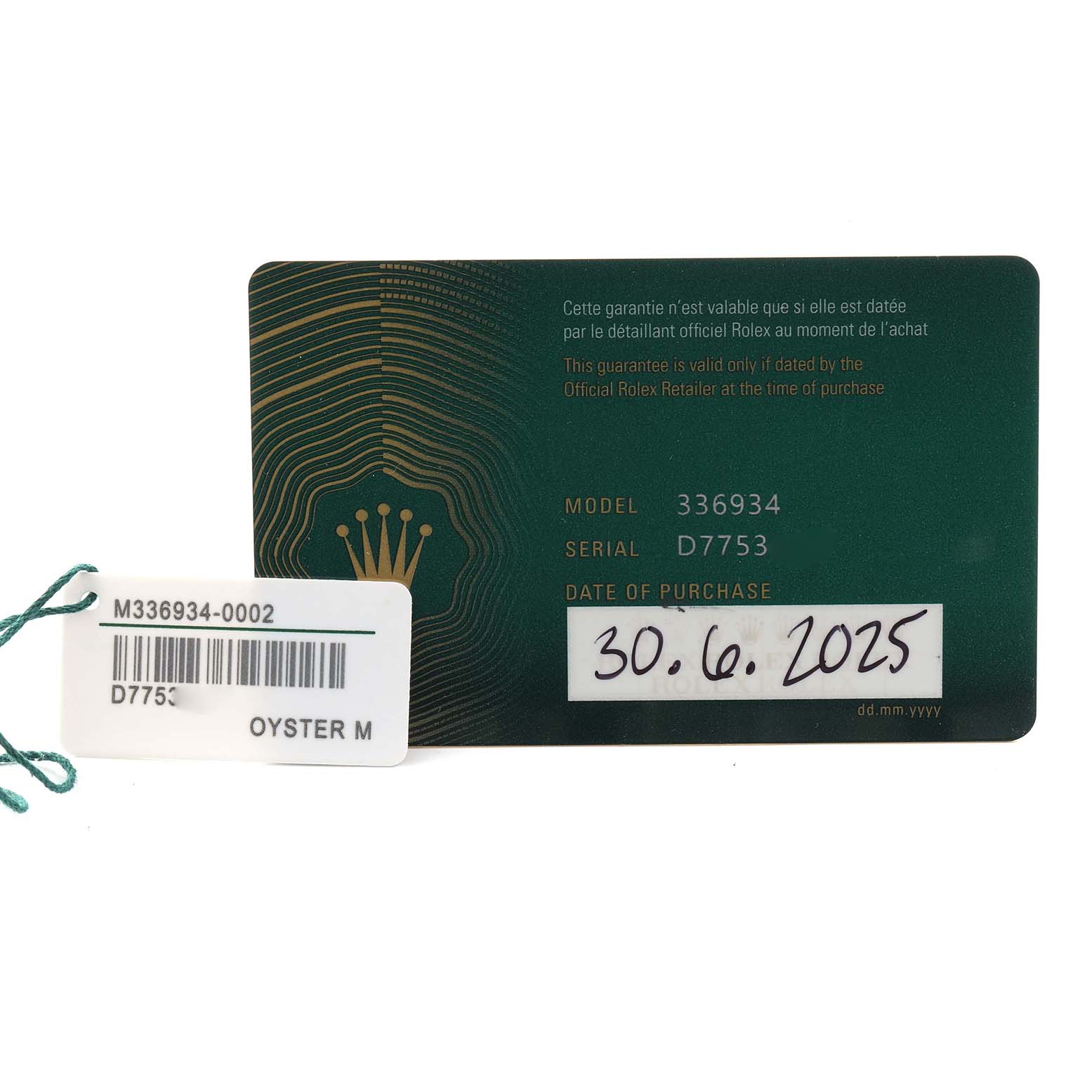 The image shows the warranty card and tag for a Rolex Sky-Dweller 336934 Men's Stainless Steel Green Dial, displaying model and serial numbers.