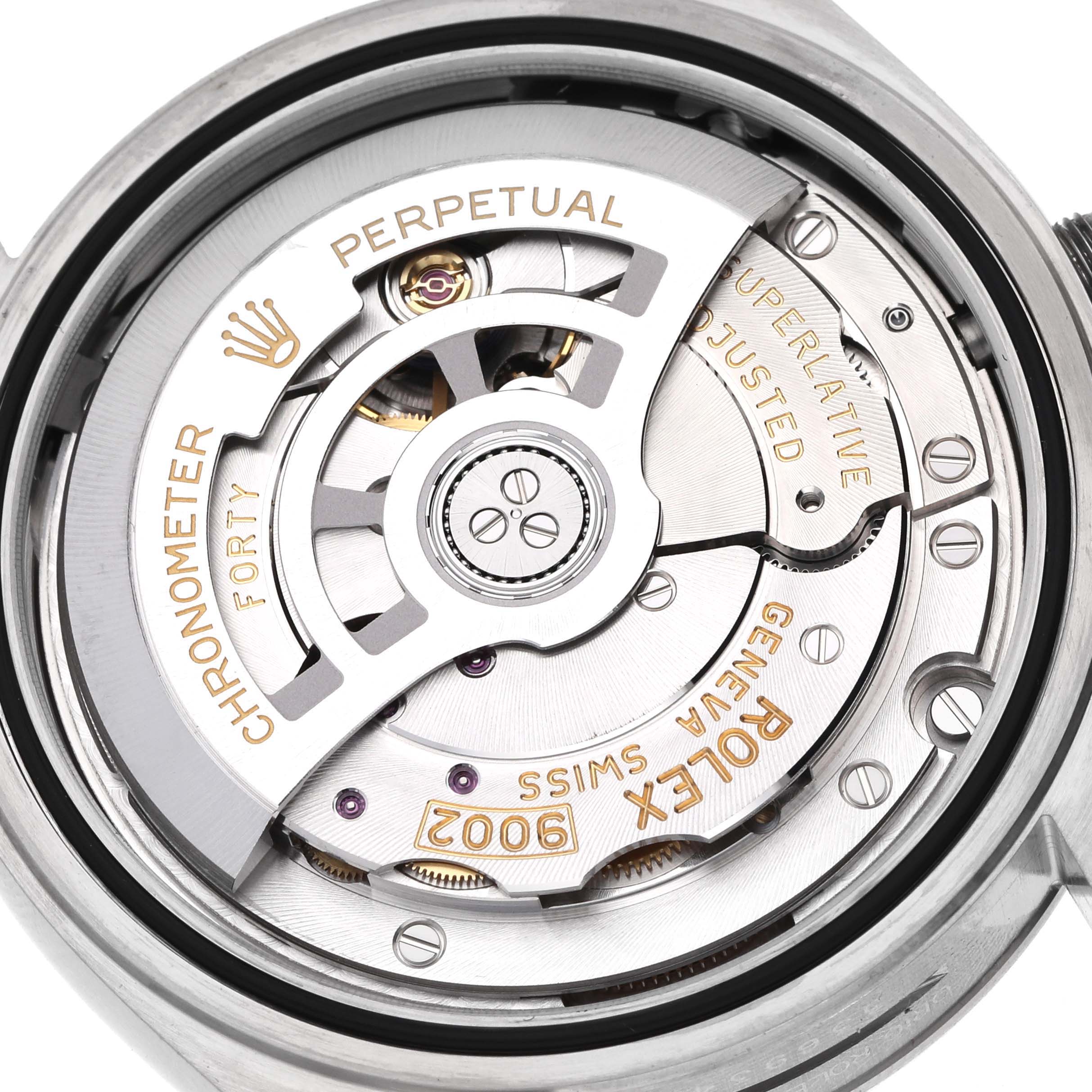 The image shows the movement of a Rolex Sky-Dweller 336934 Men's Stainless Steel Green Dial watch, focusing on the rotor and internal gear components.