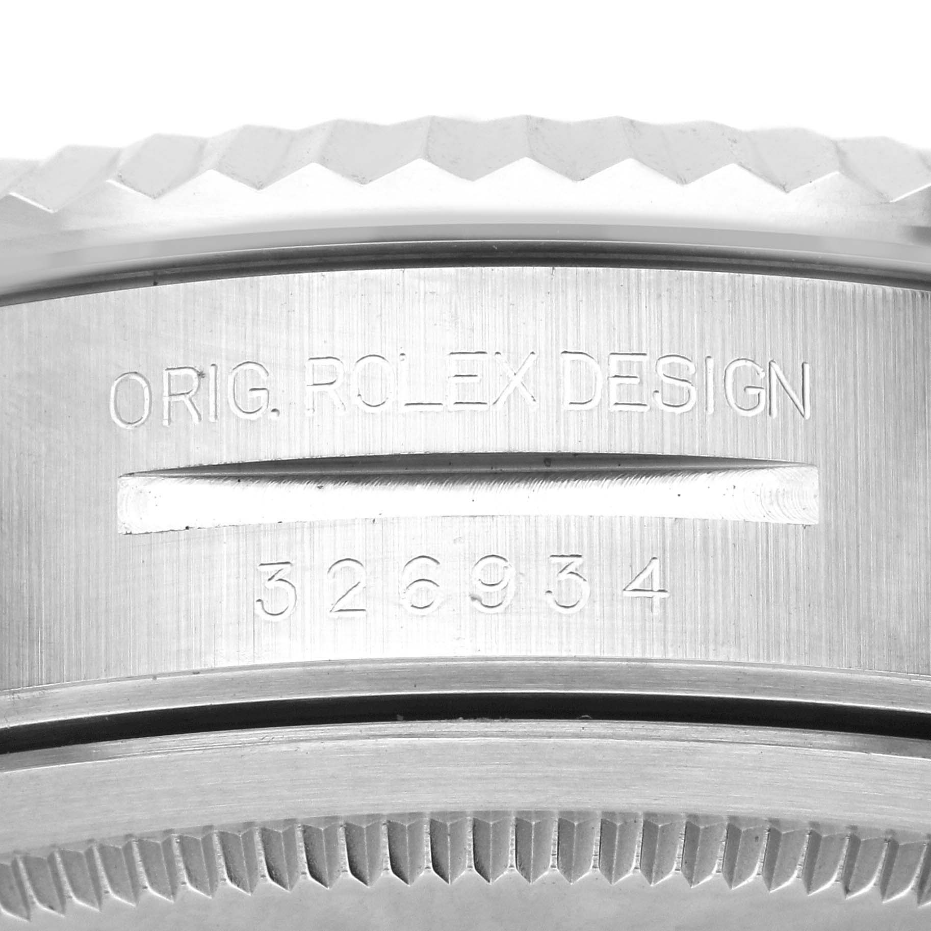 This is a close-up of the case side and serial number engraving of the Rolex Sky-Dweller 326934 Men's Stainless Steel Silver Dial 326934 Men's Stainless Steel Silver Dial watch.