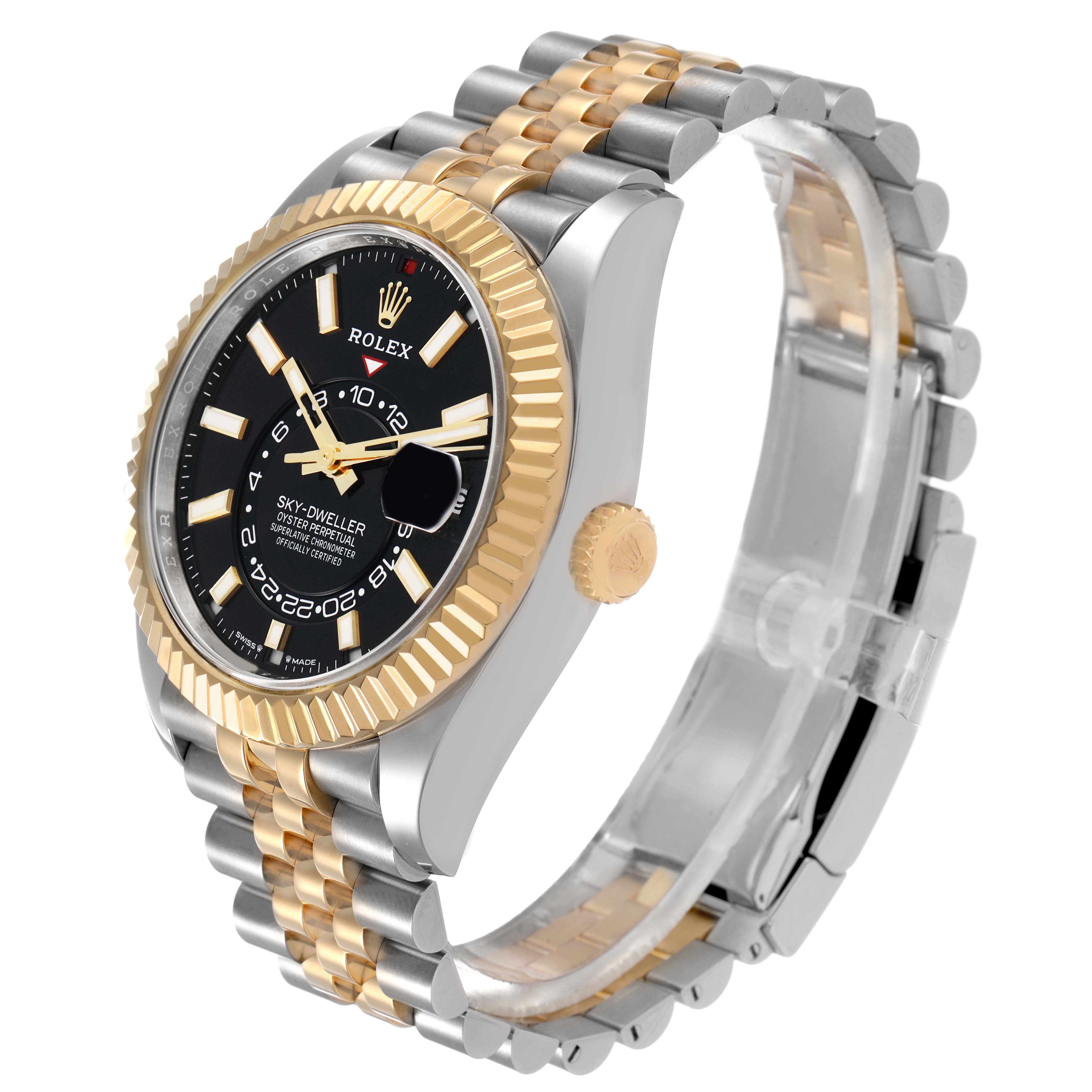 The Rolex Sky-Dweller 336933 Men's Steel and Gold (two tone) Black Dial watch is shown at a three-quarter angle, highlighting the gold bezel, black dial, and two-tone bracelet.