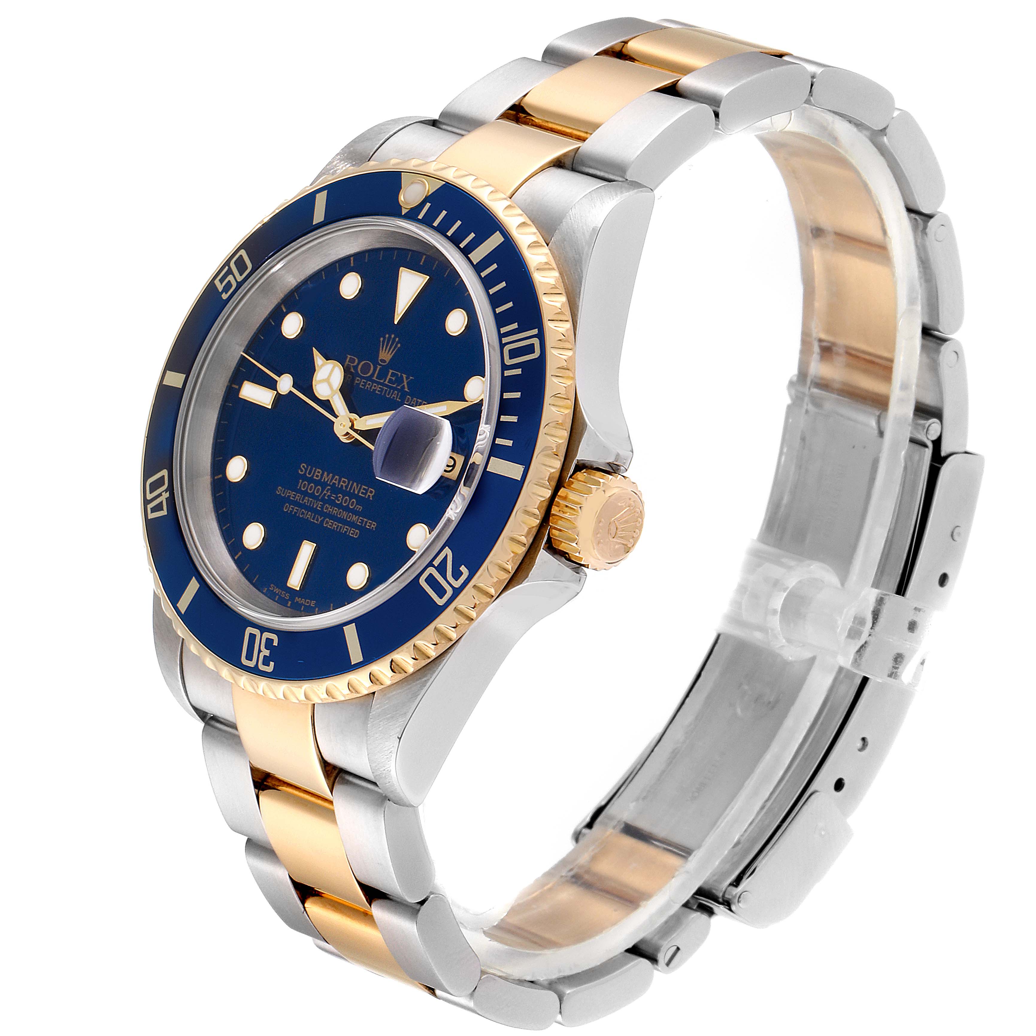 The Rolex Submariner 16613 Men
s Steel and Gold (two tone) Blue Dial 16613 Men
s Steel and Gold (two tone) Blue Dial watch is shown at an angled side view highlighting its blue dial, bi-metal bracelet, bezel, and crown.