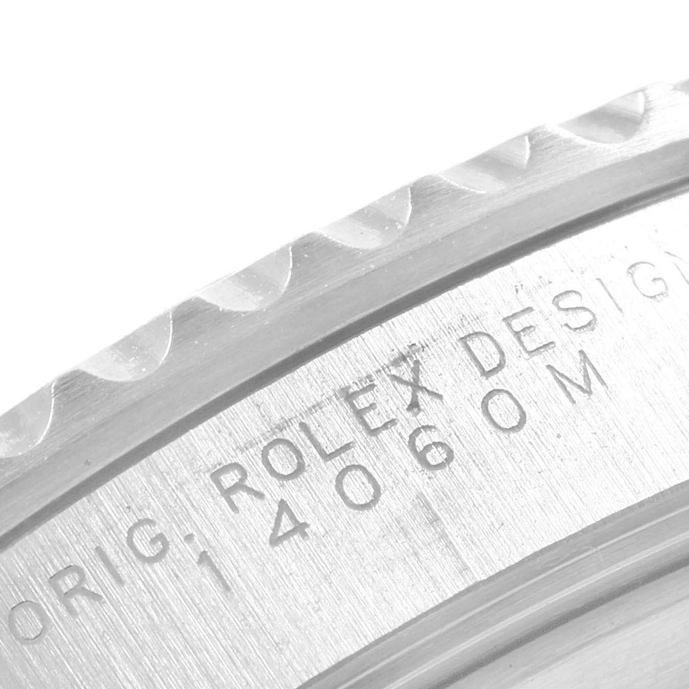 This image shows the engraved side of the bezel and the case of the Rolex Submariner 14060M Men's Stainless Steel Black Dial 14060M Men's Stainless Steel Black Dial watch.