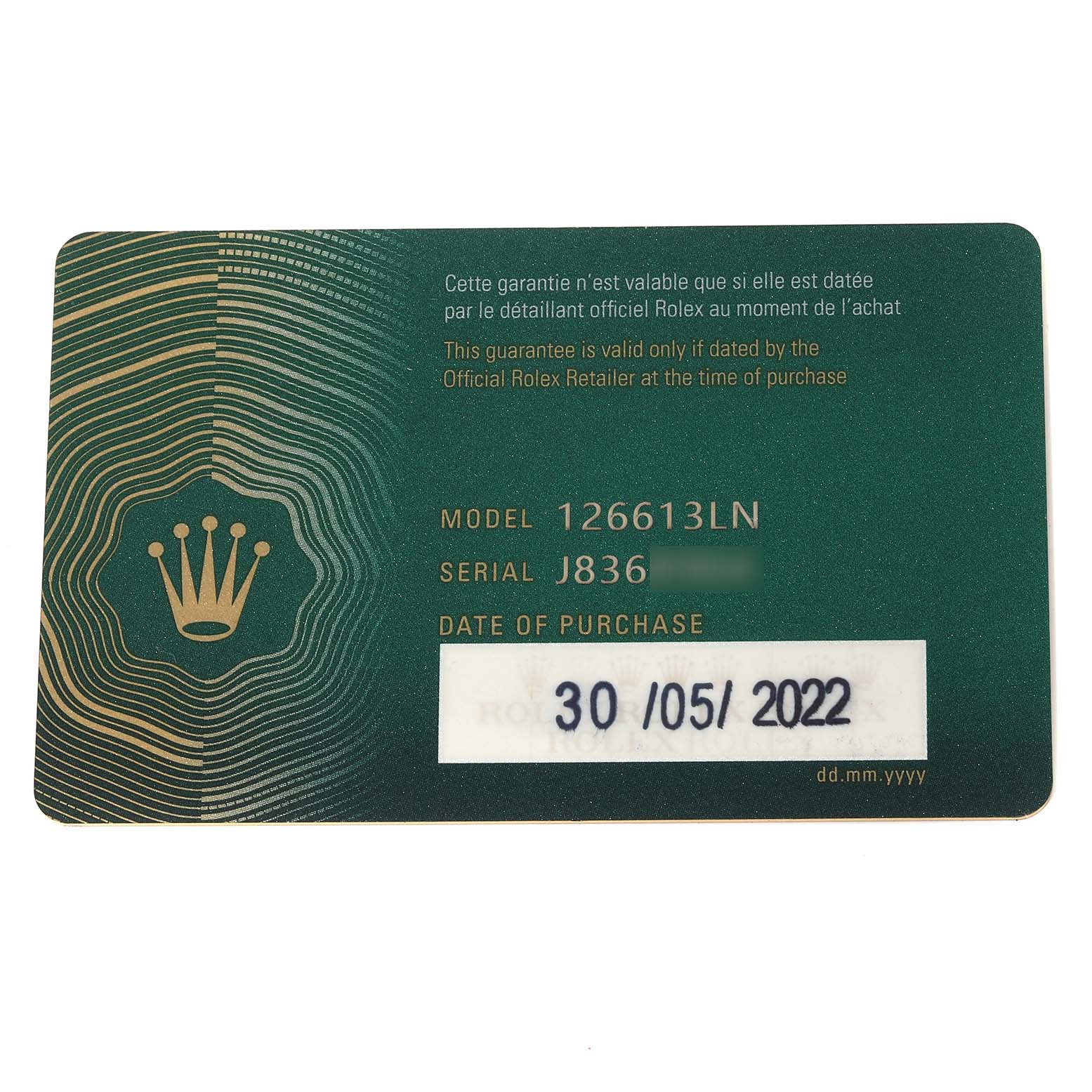 This image shows the guarantee card for a Rolex Submariner 126613LN Men's Steel and Gold (two tone) Black Dial 126613LN Men's Steel and Gold (two tone) Black Dial model 126613LN.