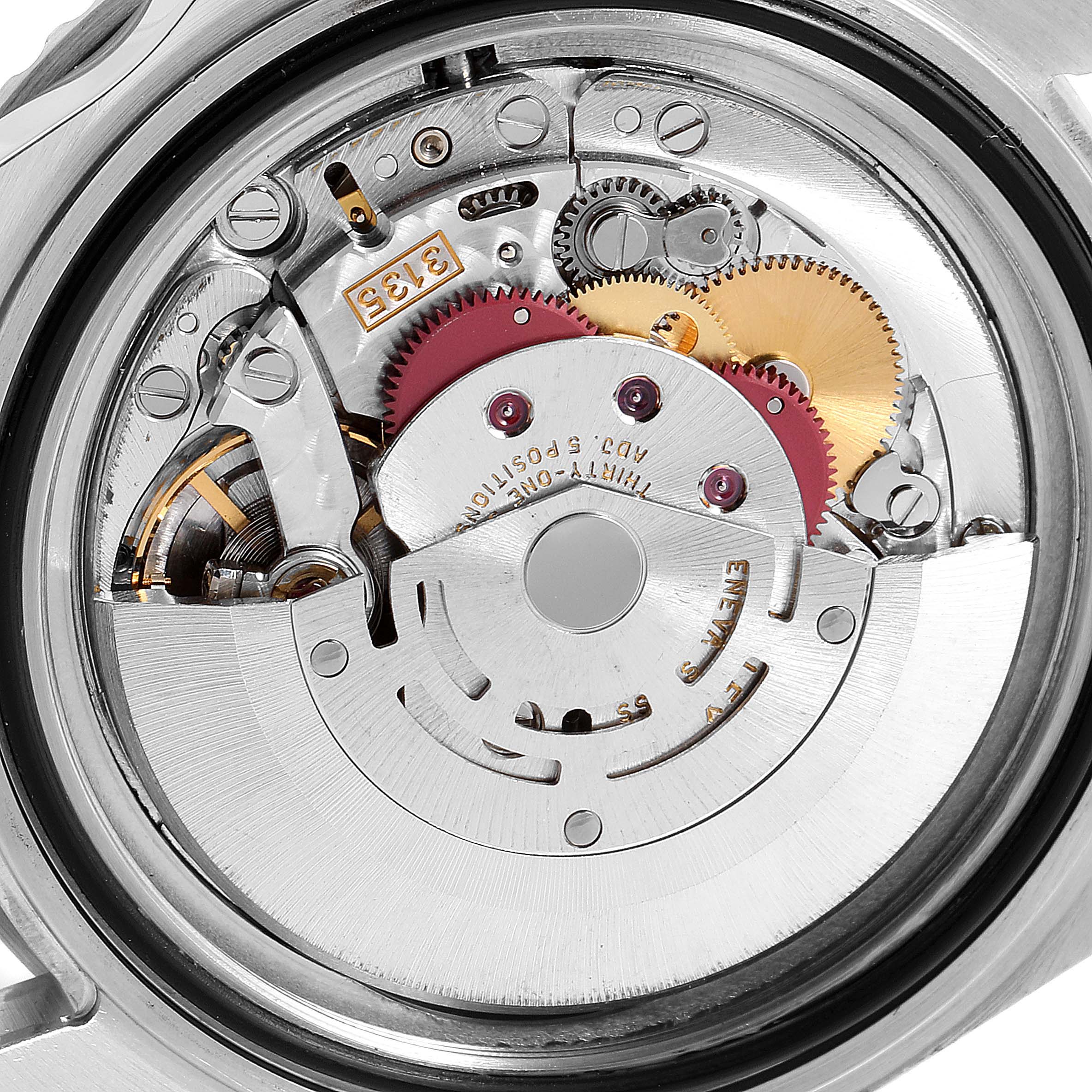 This image shows the back view of a Rolex Submariner 16610 Men's Stainless Steel Black Dial 16610 Men's Stainless Steel Black Dial watch, revealing its intricate mechanical movement components.