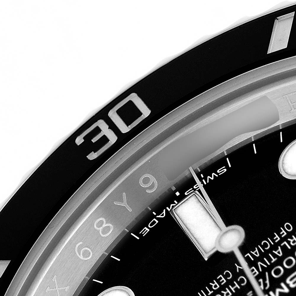 The image shows a close-up of the bezel and dial of a Rolex Submariner 114060 Men's Stainless Steel Black Dial, highlighting the "30" marker and part of the hour markers.