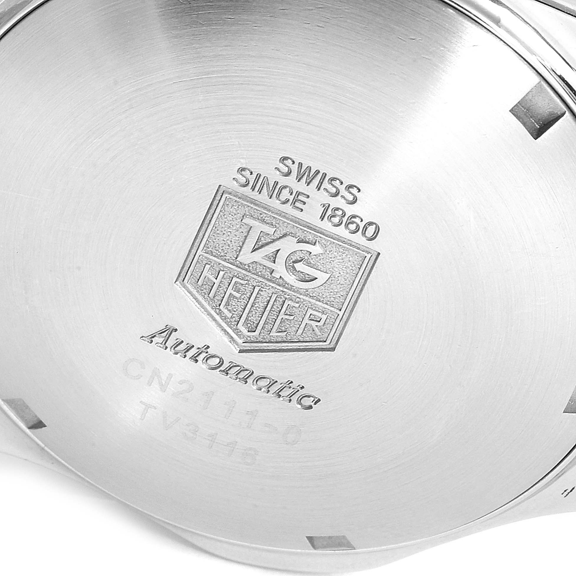 The image shows a close-up of the case back of the Tag Heuer Aquaracer CN2111.BA0361 Men
s Stainless Steel Black Dial CN2111.BA0361 Men
s Stainless Steel Black Dial watch, displaying the brand logo and model details.