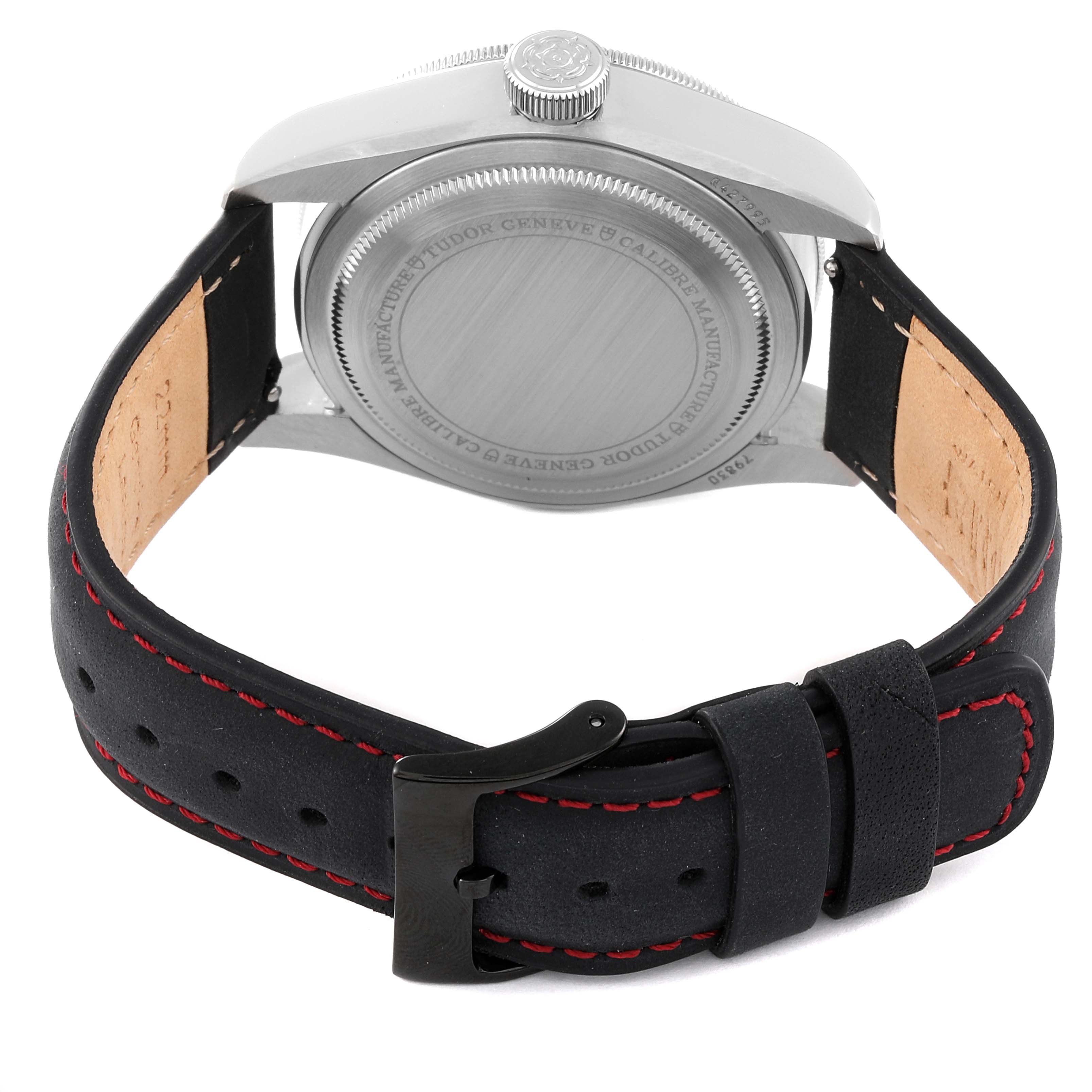The image shows the rear case and leather strap with red stitching of the Tudor Heritage Black Bay 79830RB Men's Stainless Steel Black Dial 79830RB Men's Stainless Steel Black Dial watch.