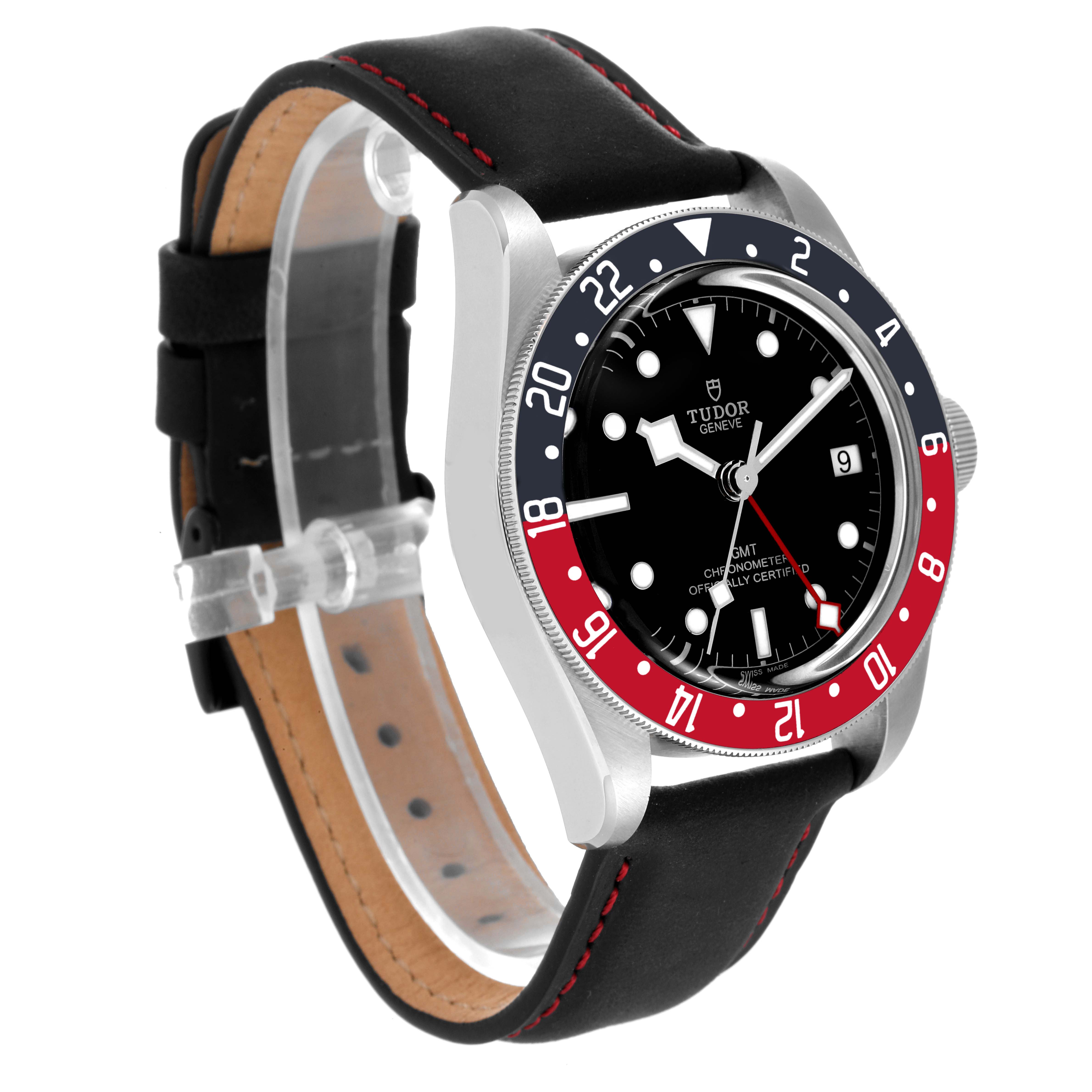 The Heritage Black Bay Tudor watch is displayed at an angled side view showing its face, bezel, case, crown, and leather strap.