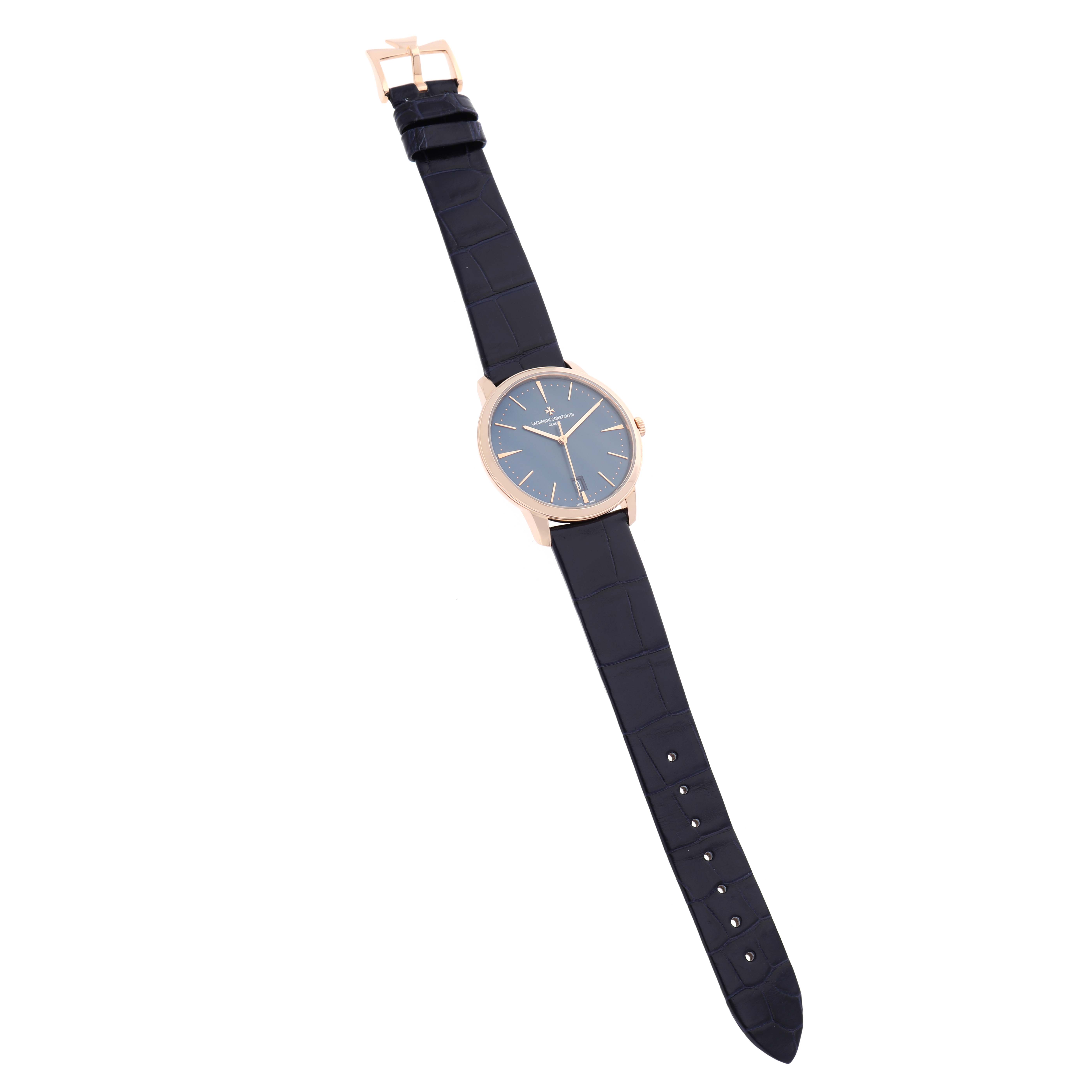The Vacheron Constantin Patrimony 4100U Men's Rose Gold Blue Dial watch is shown from an overhead angle, displaying the full face, strap, and buckle.