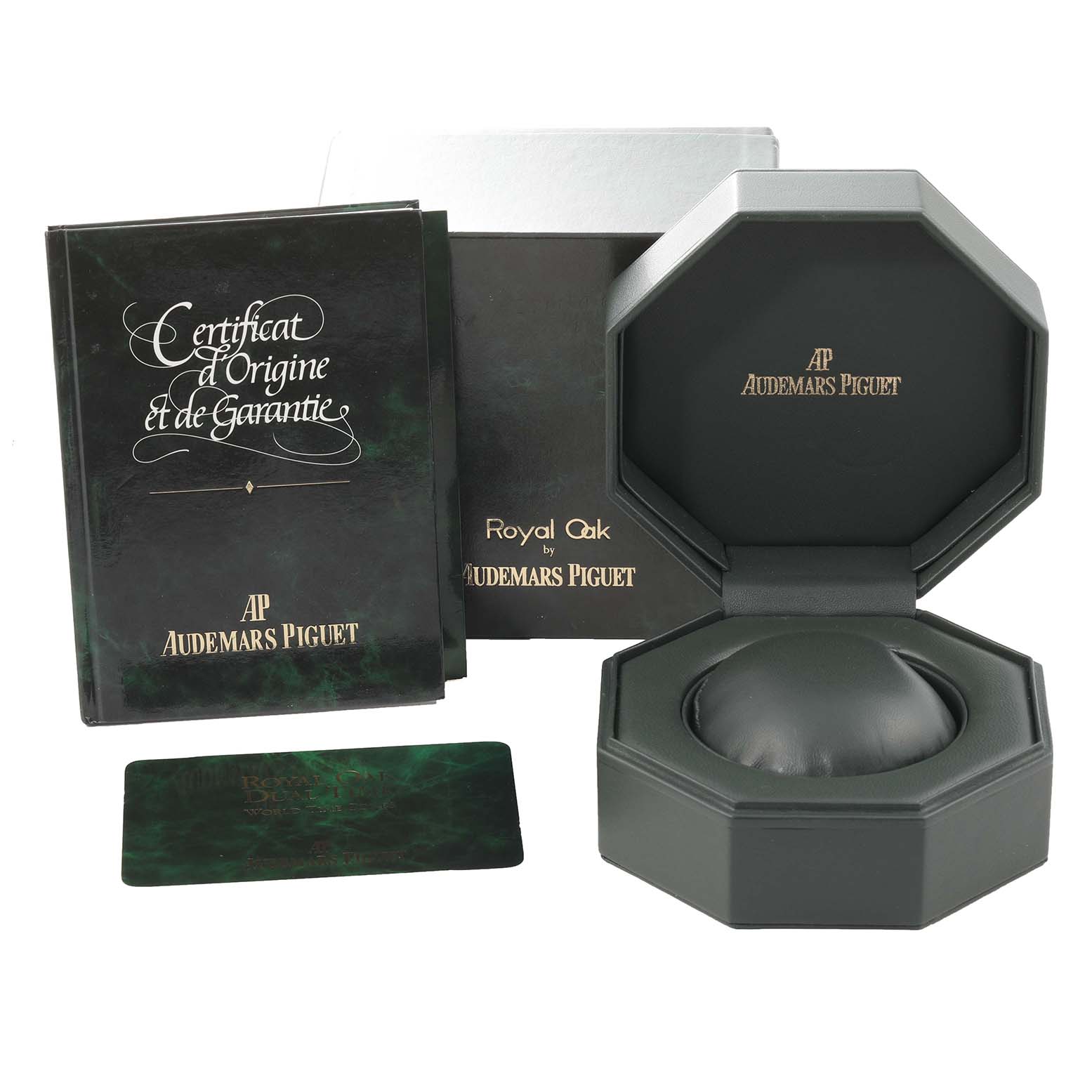 This image shows the box, warranty card, certificate, and packaging for the Audemars Piguet Royal Oak 25730BA Men
s Yellow Gold Silver Dial 25730BA Men
s Yellow Gold Silver Dial.