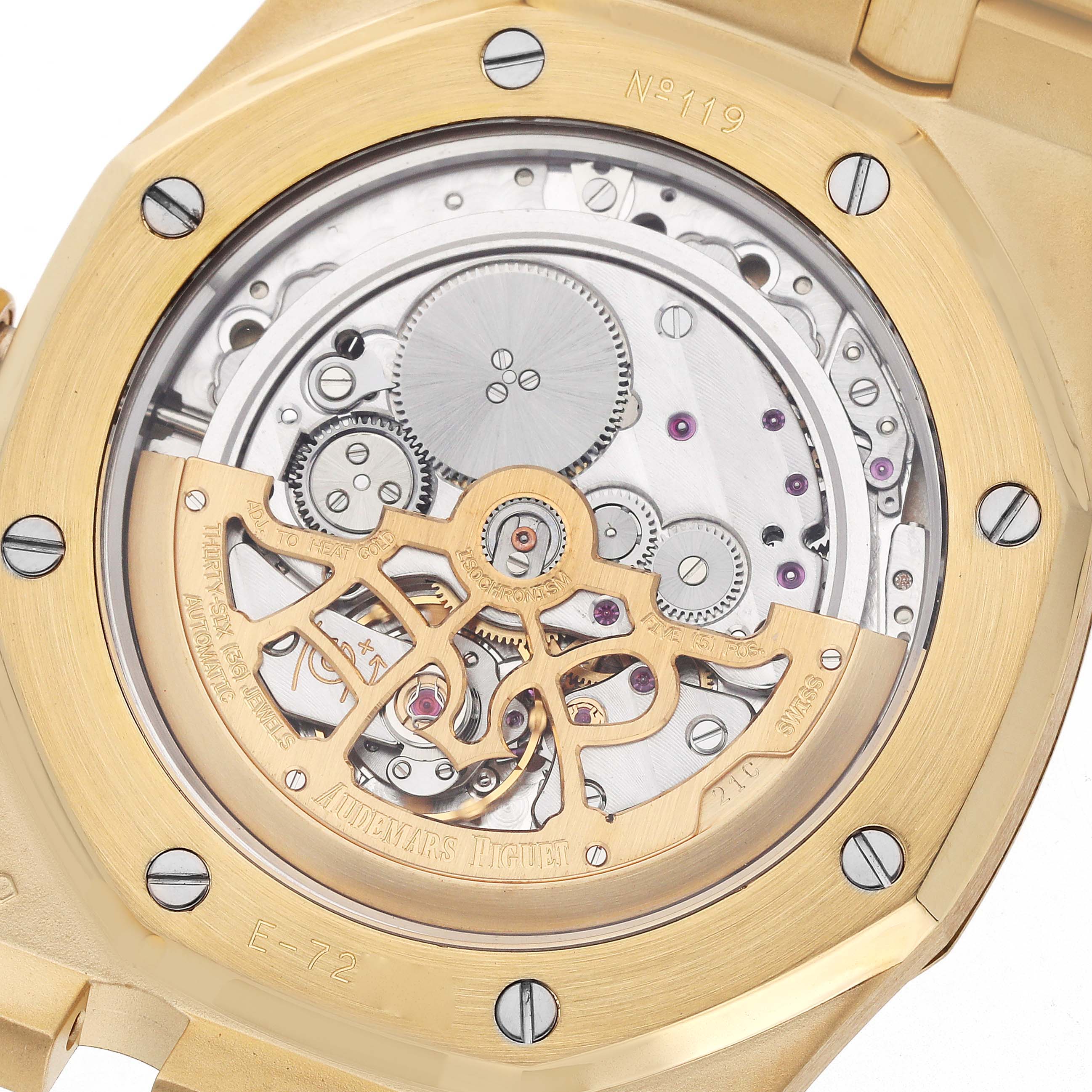 The image shows the back of an Audemars Piguet Royal Oak 15202BA.OO.0944BA.01 Men's Yellow Gold White Dial watch, highlighting its movement and rotor details.