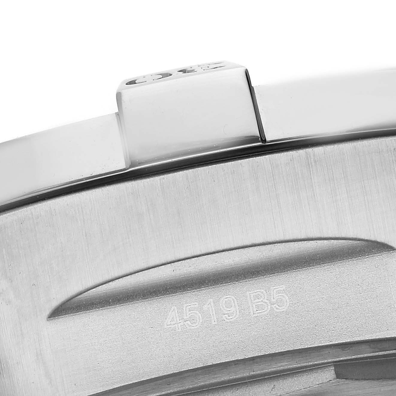 The image shows a close-up of the clasp and band of a Breitling Avenger A13385 Men's Stainless Steel Black Dial watch from a side angle.