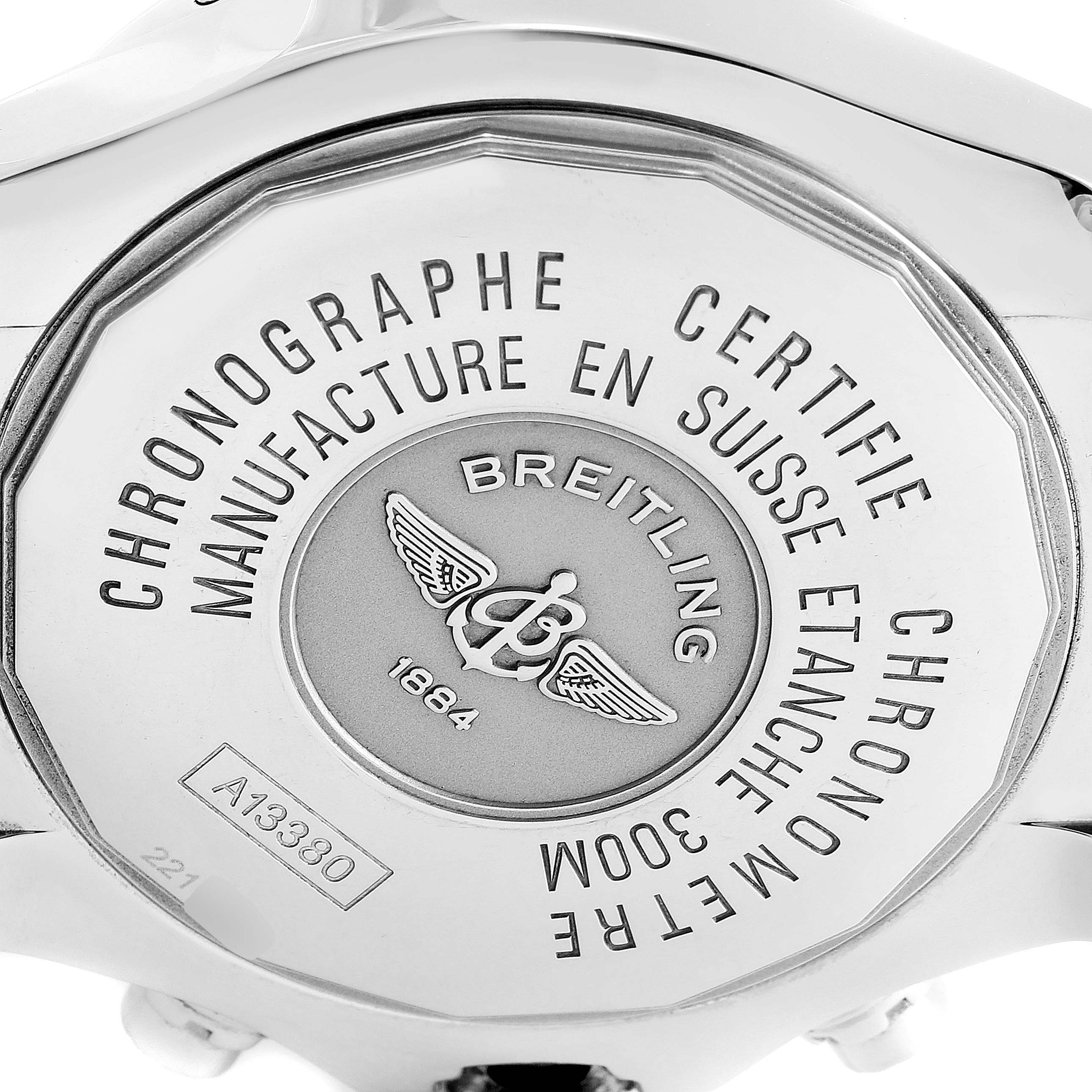 The image shows the case back of a Breitling Avenger A13381 Men's Stainless Steel Blue Dial A13381 Men's Stainless Steel Blue Dial watch, highlighting its engravings and serial number.