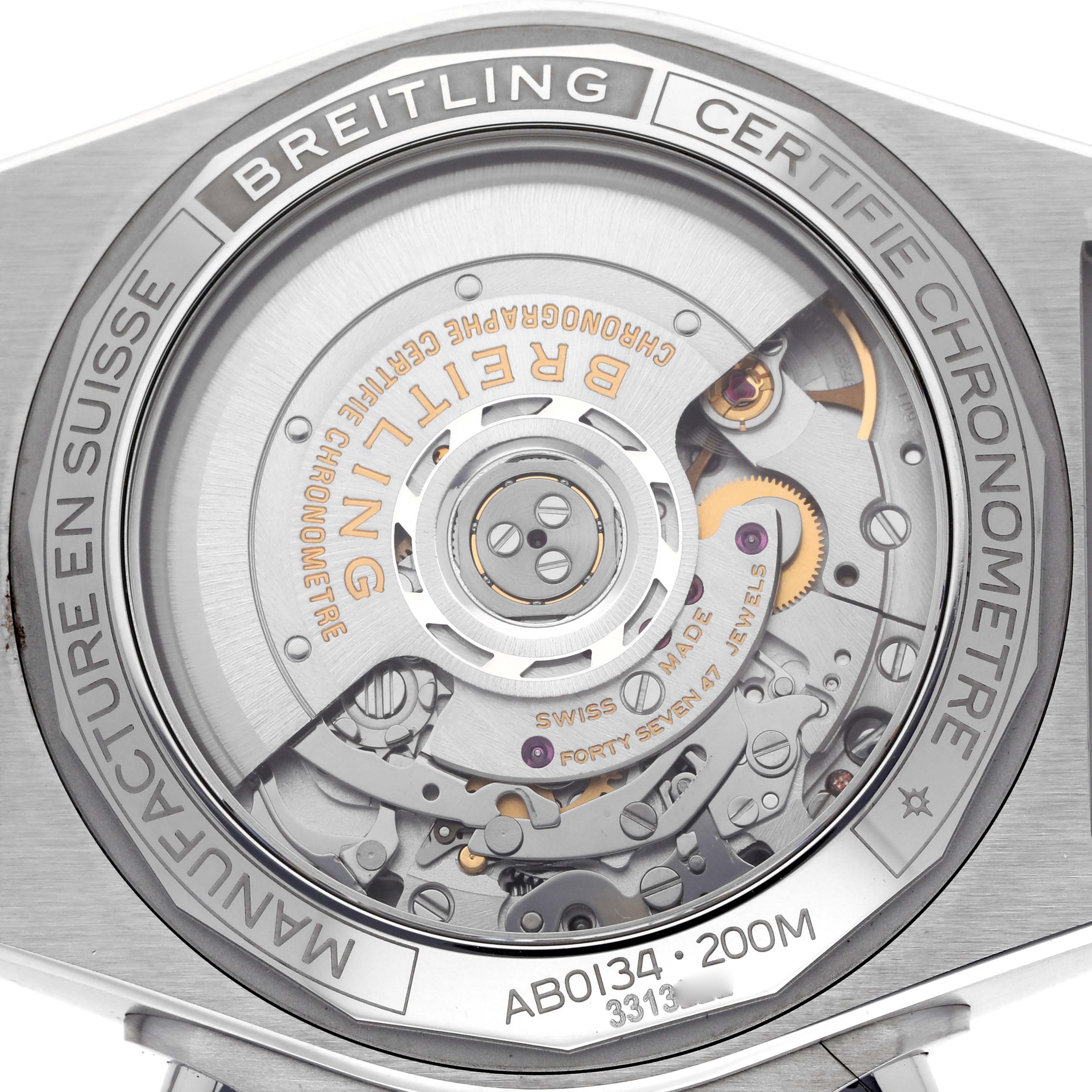 The image shows the back view of a Breitling Chronomat AB0134 Men's Stainless Steel Black Dial watch, revealing the intricate movement and rotor details.