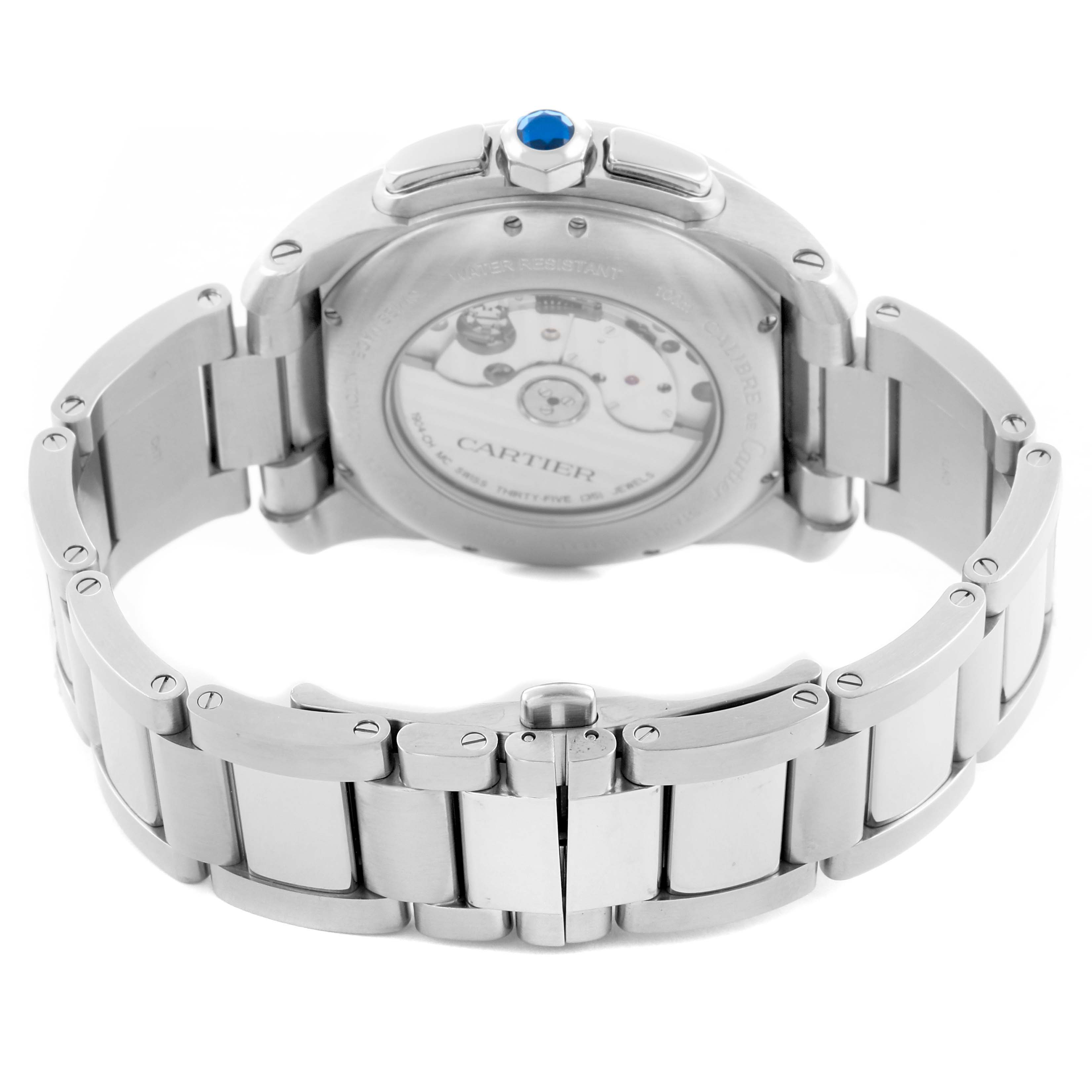 The image shows the back of a Calibre de Cartier watch, highlighting the movement and bracelet.