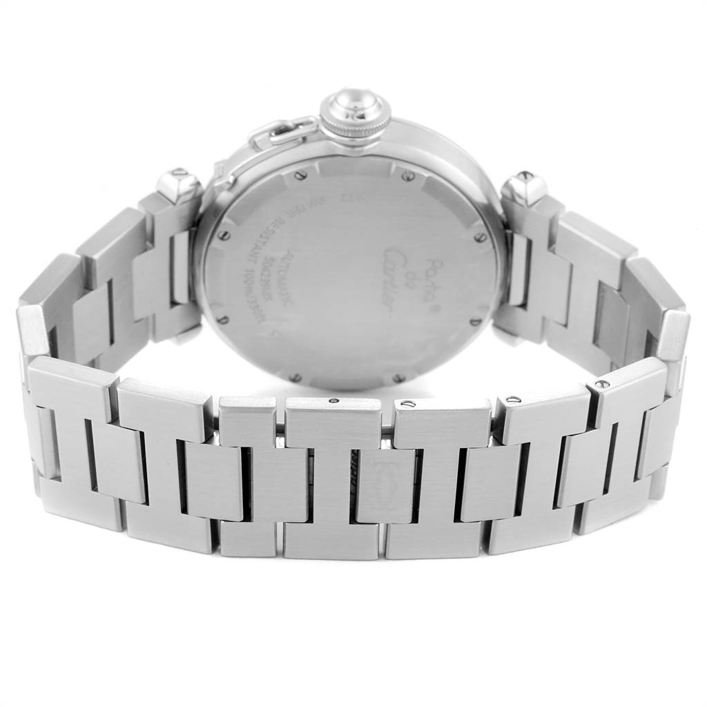 The image shows the back view of a Cartier Pasha W31049M7 Men's Stainless Steel Black Dial W31049M7 Men's Stainless Steel Black Dial model watch, focusing on the case back and stainless steel bracelet.