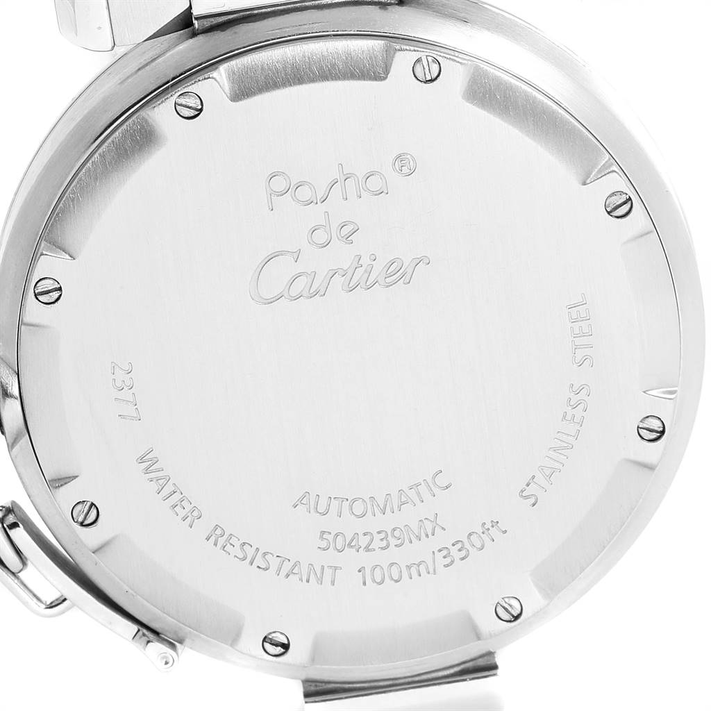 This image shows the back cover of a Cartier Pasha W31049M7 Men's Stainless Steel Black Dial W31049M7 Men's Stainless Steel Black Dial watch, highlighting its engraved details and screws.