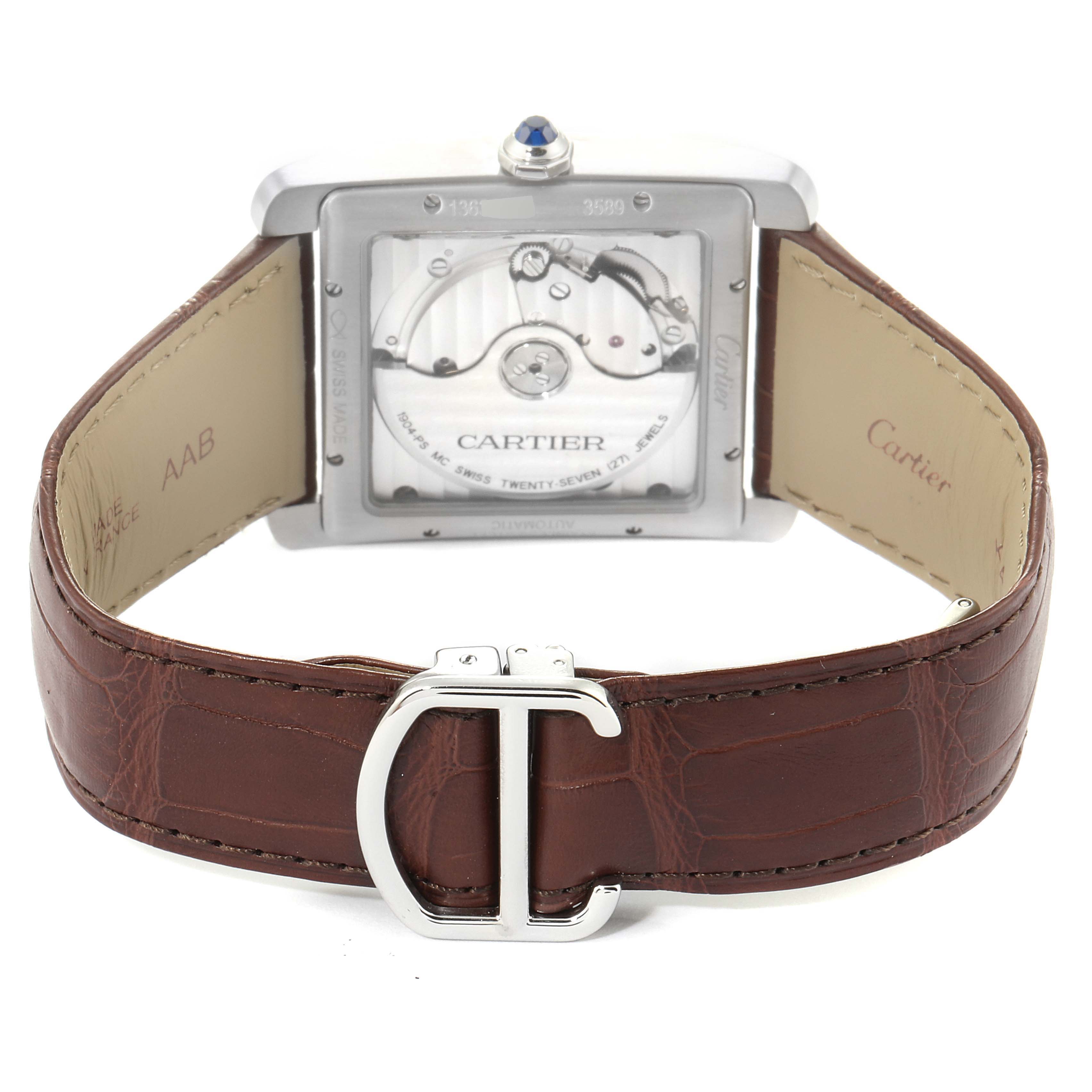 The image shows the back view of a Cartier Tank MC W5330003 Men's Stainless Steel Silver Dial W5330003 Men's Stainless Steel Silver Dial watch, highlighting the movement mechanism and leather strap with a clasp.