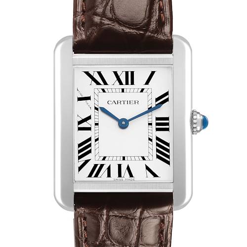 The Cartier Tank Solo WSTA0030 Women's Stainless Steel Silver Dial watch is shown from a straight-on angle, displaying its rectangular face, Roman numerals, blue hands, and crown with a blue gem.
