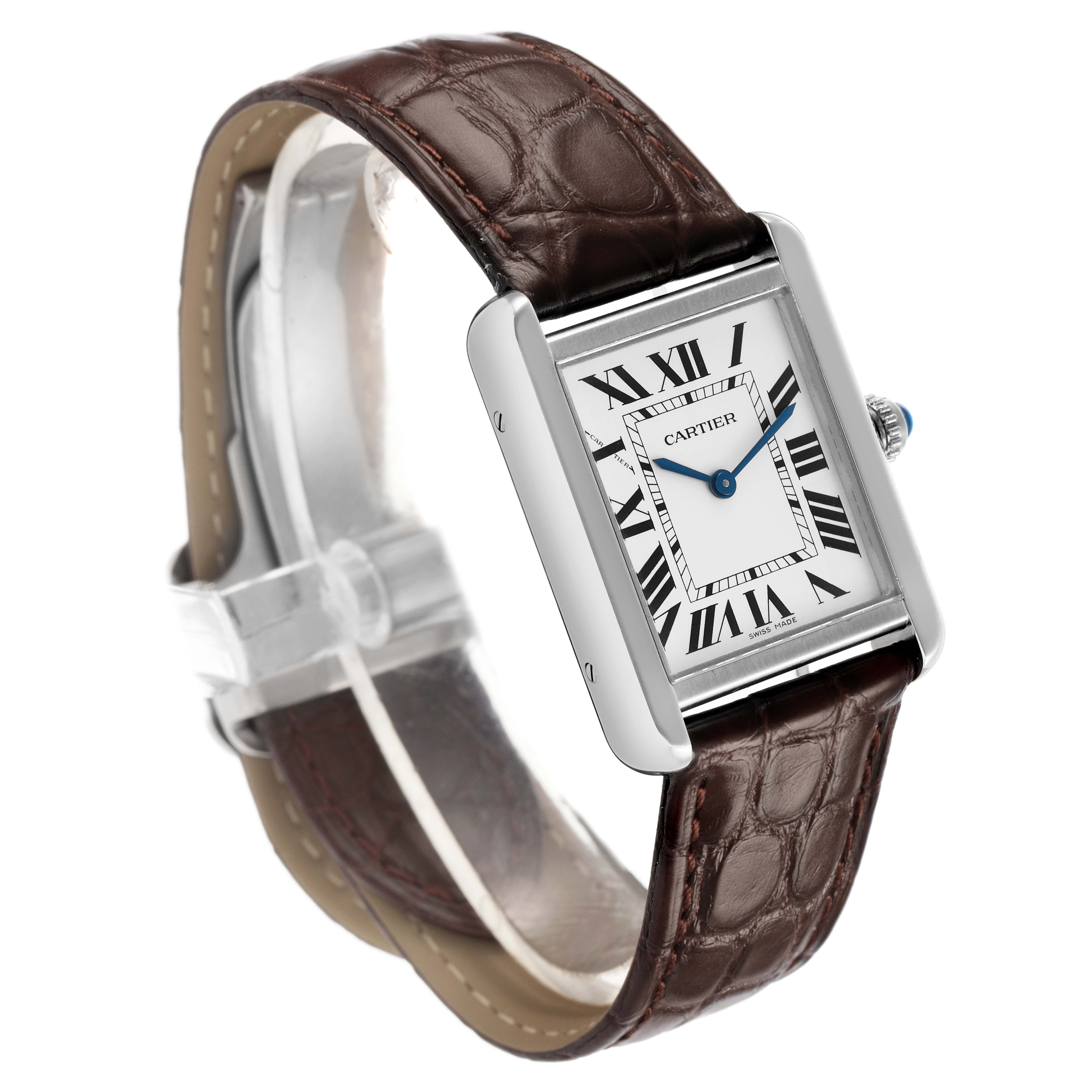 The Cartier Tank Solo WSTA0030 Womens Stainless Steel Silver Dial watch is shown from a three-quarter angle, highlighting its face, crown, and brown leather strap.