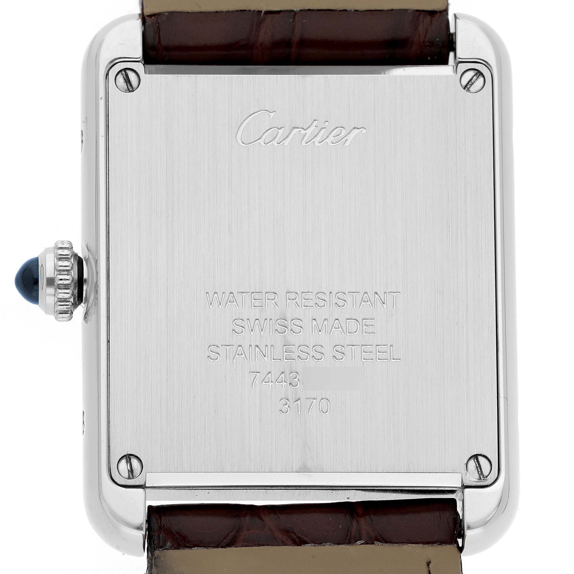 The image shows the back of a Cartier Tank Solo WSTA0030 Womens Stainless Steel Silver Dial watch, highlighting the stainless steel casing and engraved details.
