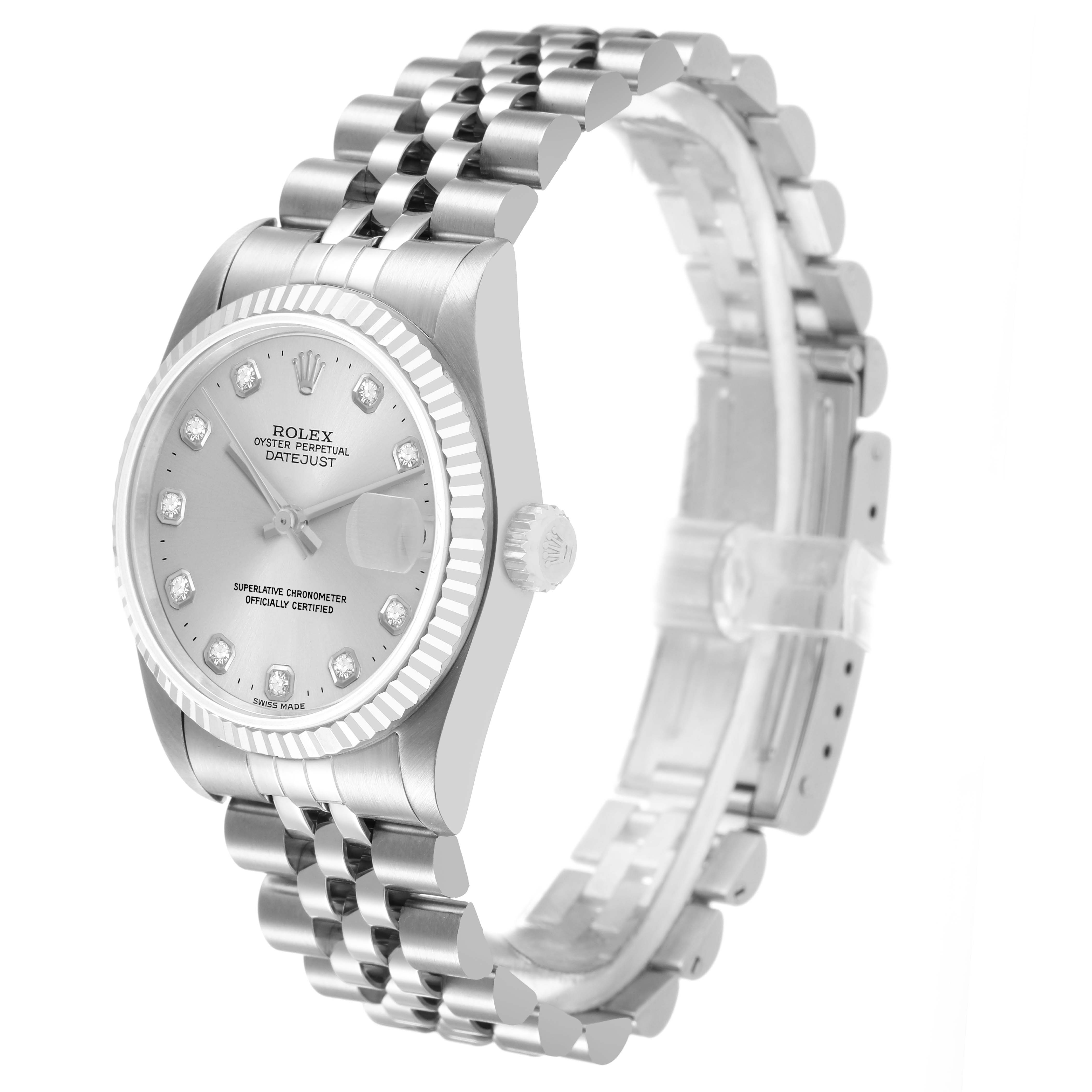The image shows an angled view of a Rolex Datejust watch with its face, bezel, crown, and bracelet visible.