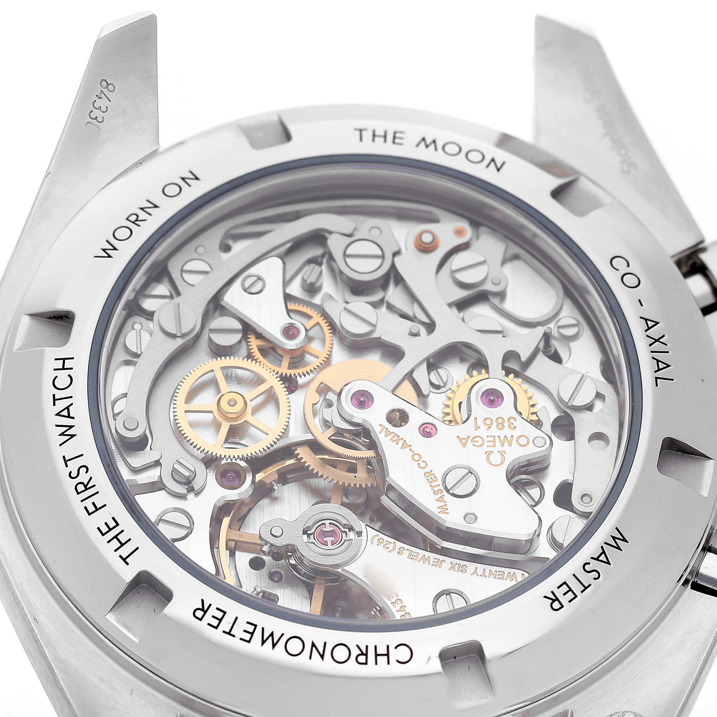 The image shows the back view of an Omega Speedmaster 310.32.42.50.01.002 Mens Stainless Steel Black Dial, highlighting its intricate movement and components.