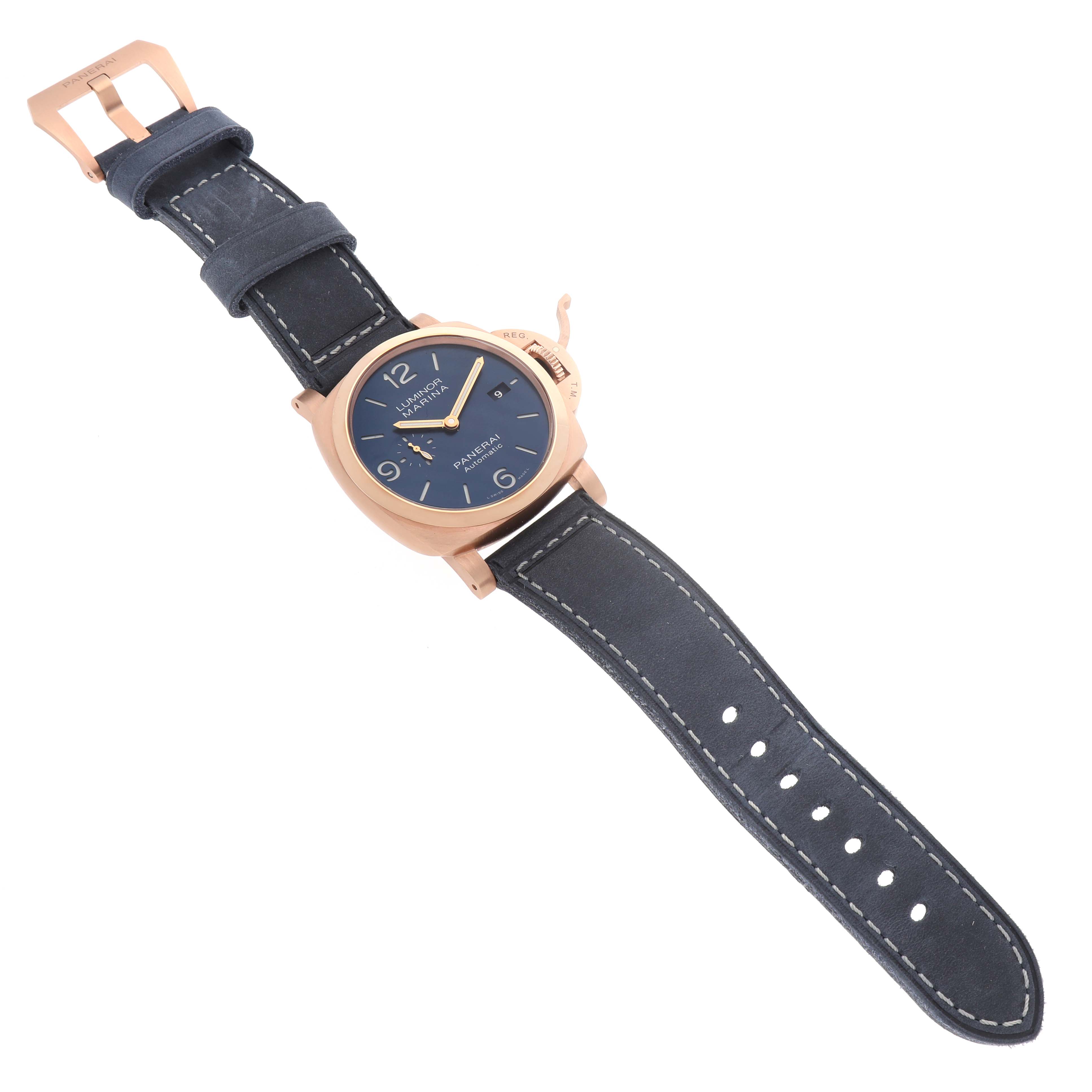 The Panerai Luminor PAM01112 Men's Rose Gold Blue Dial watch is shown at an angled view, highlighting the case, dial, crown guard, and leather strap.
