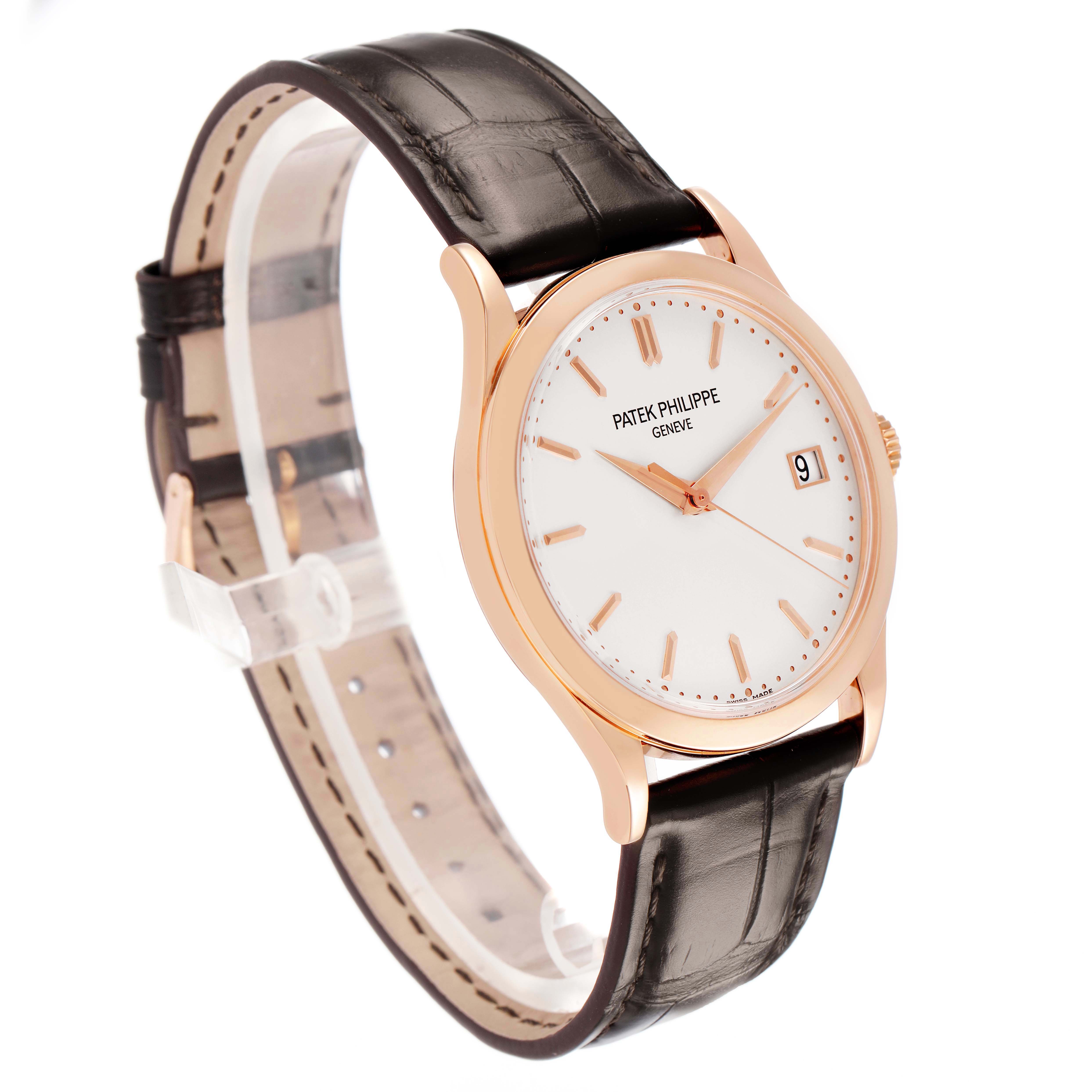 The Patek Philippe Calatrava 5296R-010 Men's Rose Gold Silver Dial watch is shown at a three-quarter angle highlighting the face, case, and leather strap.
