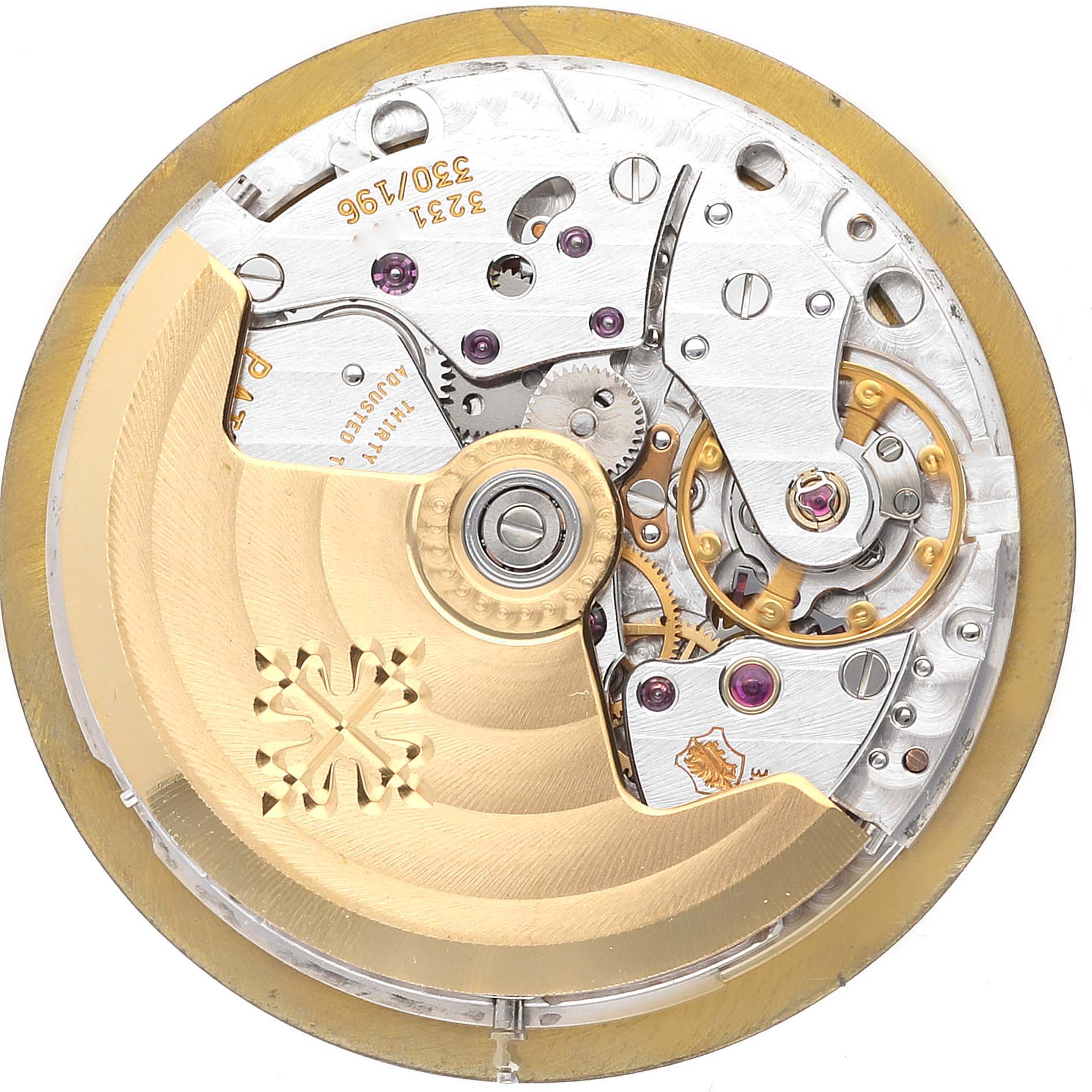 This image shows a close-up view of the movement mechanism of a Nautilus model by Patek Philippe.