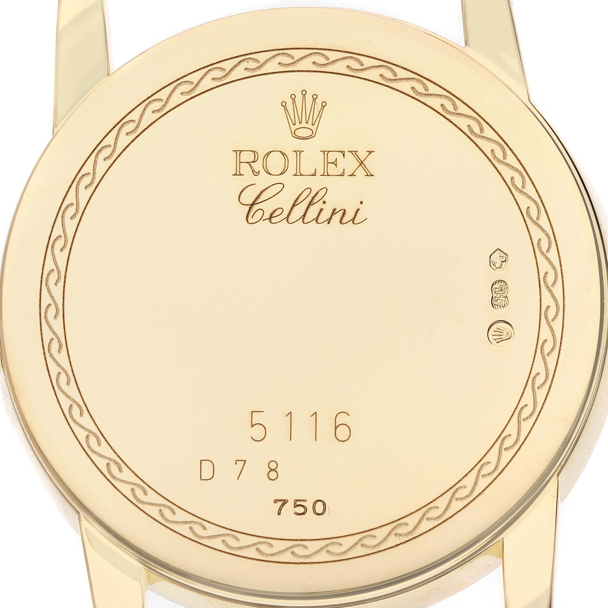 The image shows the back case of a Rolex Cellini 5116 Men's Yellow Gold Champagne Dial watch, featuring engravings and detail work.
