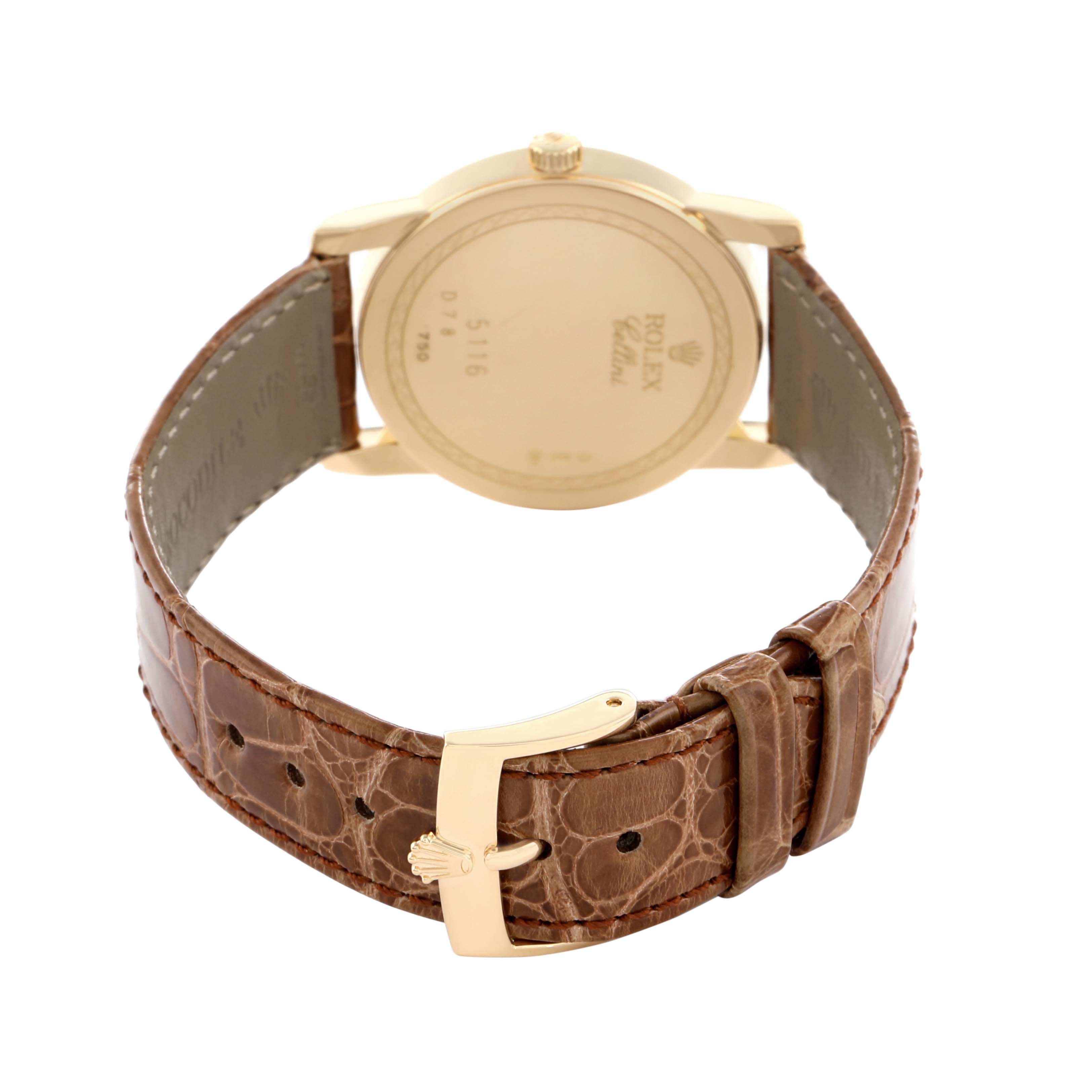 The image shows the back view of a Rolex Cellini 5116 Men's Yellow Gold Champagne Dial watch featuring its case back, lugs, and a leather strap with a buckle.