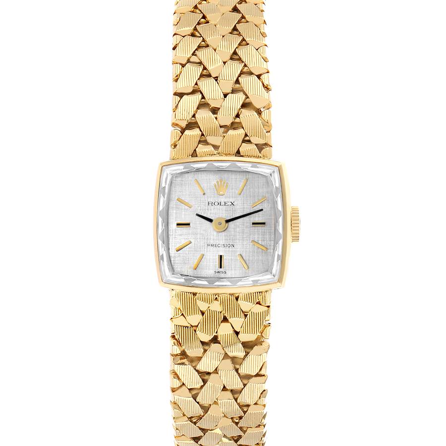 The Rolex Cocktail 8298 Women's Yellow Gold Silver Dial model is shown from a top view, featuring its gold case, textured dial, and detailed bracelet.
