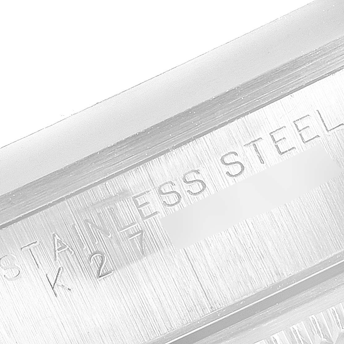 This close-up image shows the stainless-steel marking on the case side of the Rolex Date 15200 Men's Stainless Steel Black Dial 15200 Men's Stainless Steel Black Dial model watch.