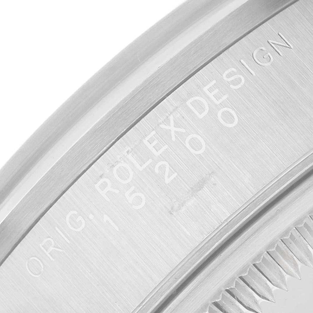 The image shows the side view of a Rolex Date 15200 Men's Stainless Steel Black Dial model case with engraved text.