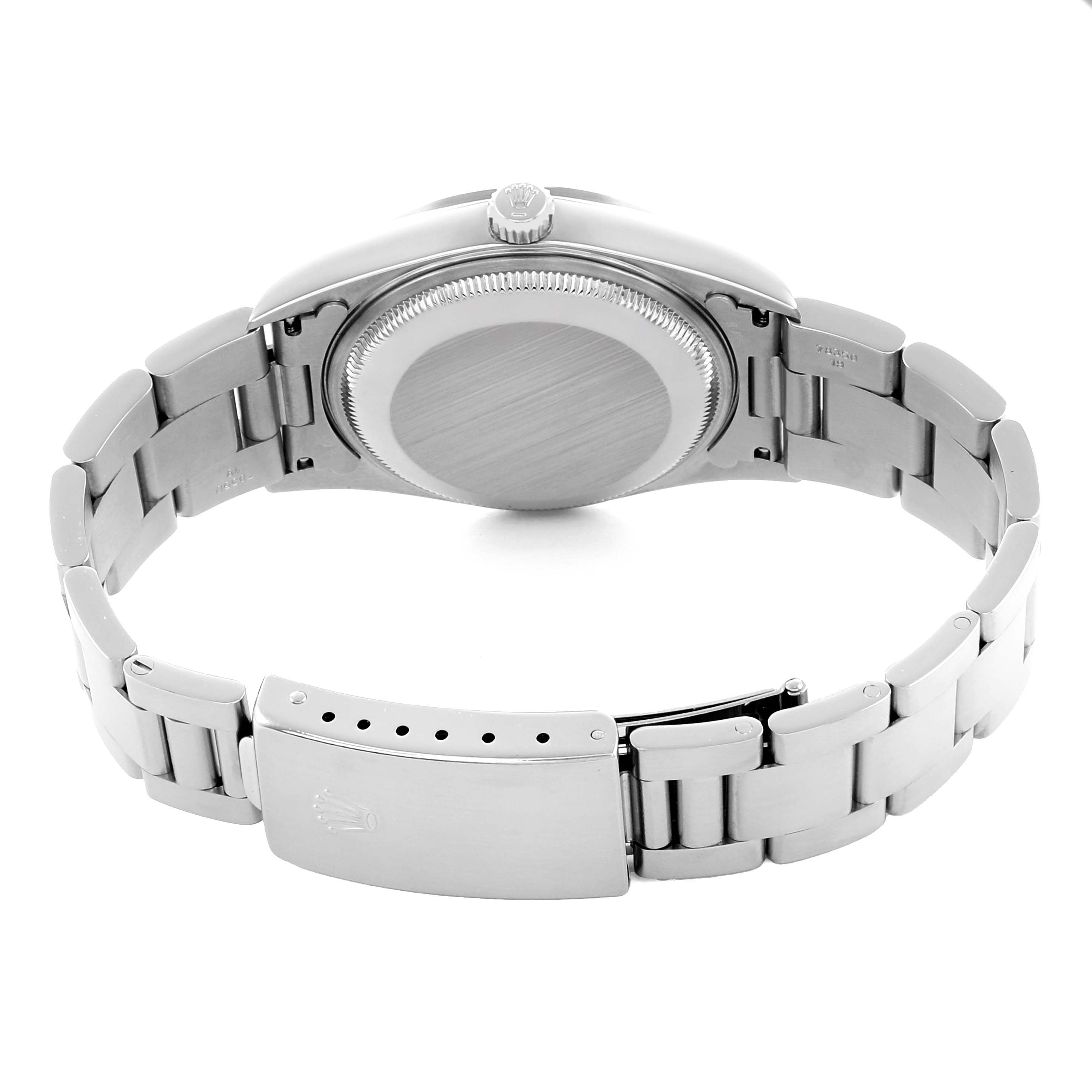 The image shows the back and side of a Rolex Date 15200 Men's Stainless Steel Black Dial model, highlighting the clasp, bracelet, and case back.