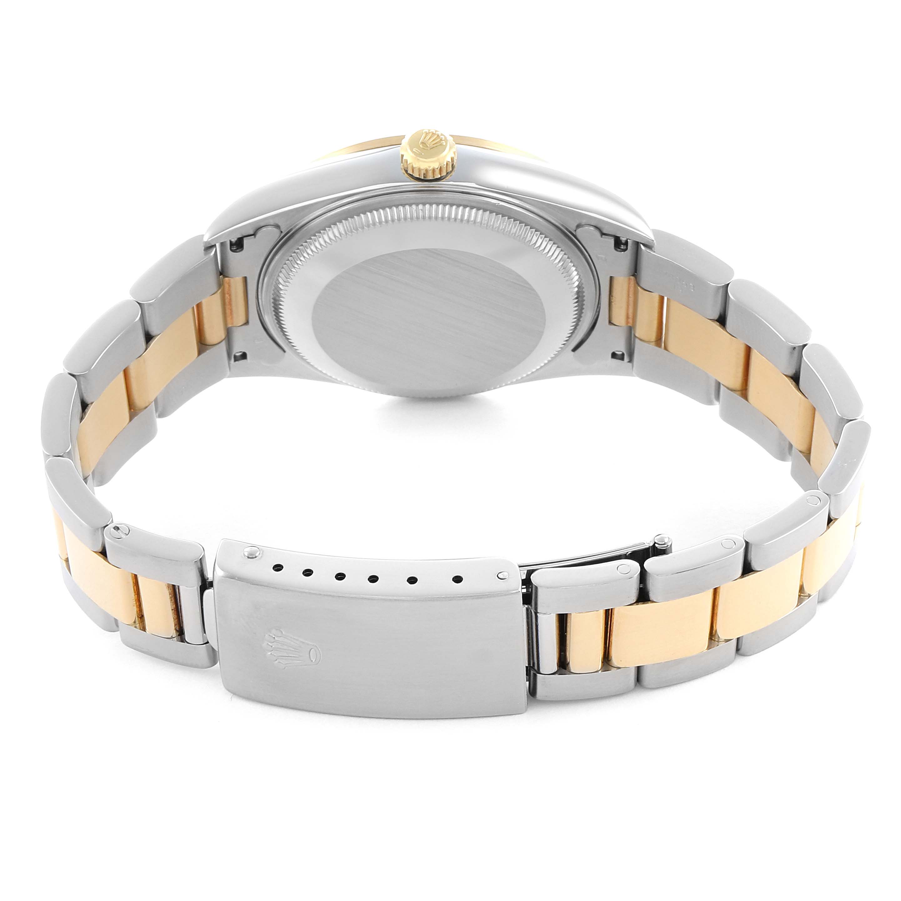 The image shows the back of a Rolex Date 15203 Men's Steel and Gold (two tone) Champagne Dial model watch, displaying the case back and two-tone bracelet.