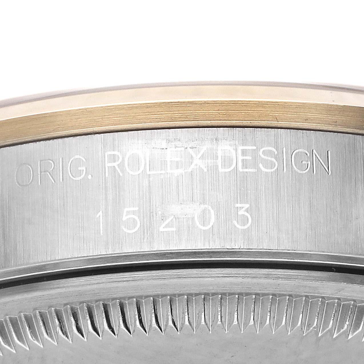 The image shows a close-up of the case side, bezel, and model number of a Rolex Date 15203 Men's Steel and Gold (two tone) Champagne Dial watch.
